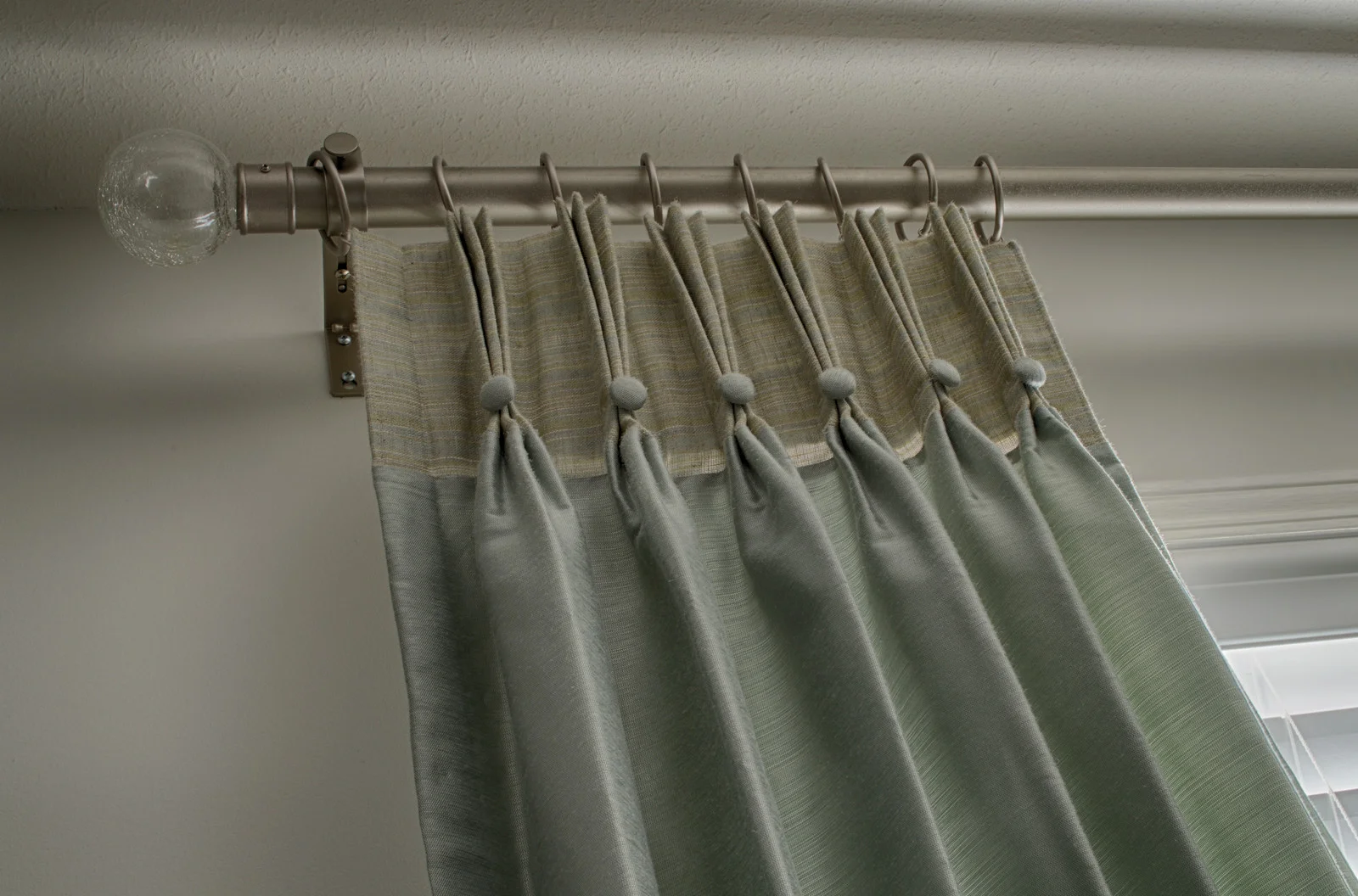 <p><strong></strong>Days Design Custom - Pinch pleat drapery with banding- Robert Allen fabric- Lavish Lane, color Sprind. Banding - Unique fabric Firestone, color Breeze