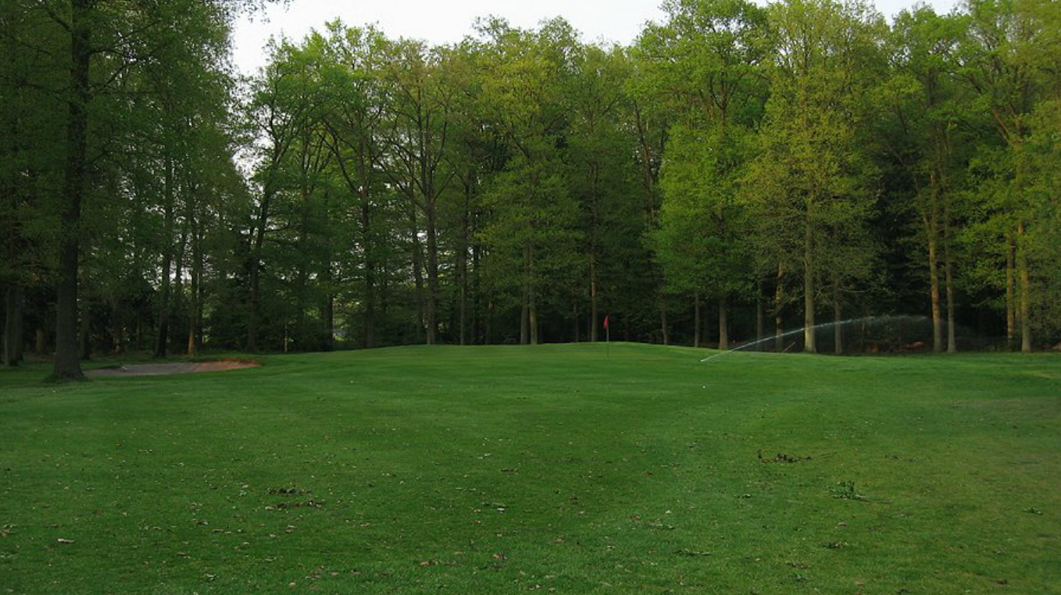 Hole 14 before. Hard to believe, but there is a bunker over there on the right.