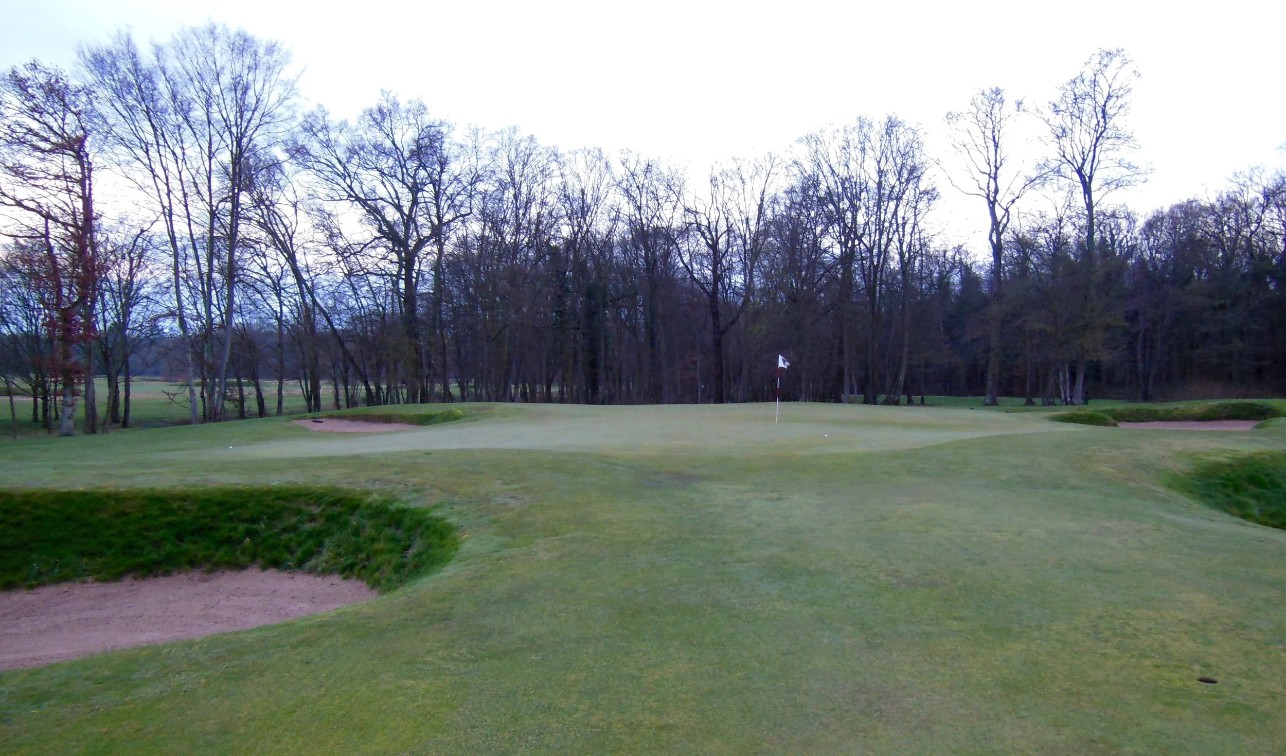 The greens at Chantilly are understated brilliance. They adhere to the broad movements of the site, and they are full of simple and subtle moves that make a big impact upon play. Look here at the two balls. The one on the right was rolled right at the flag. The one on the far left edge was rolled about 10 feet (3 meters) left of the flag.