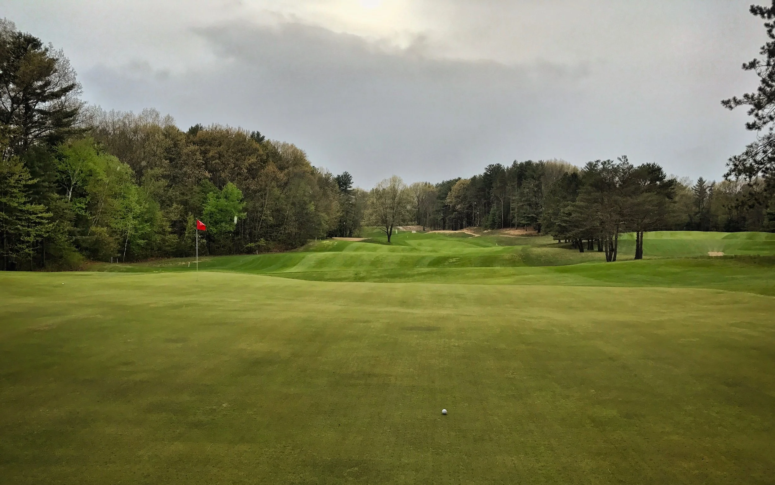 The land at McGregor Links tumbles as if it were a British seaside links. This is the view from the green looking back down the hole, which doesn't show the numerous center line hazards that are to also be dealt with along the way.