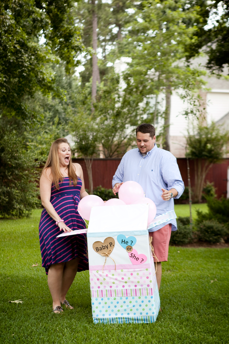 gender reveal with balloons