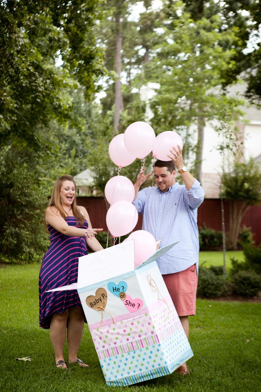 gender reveal with balloons