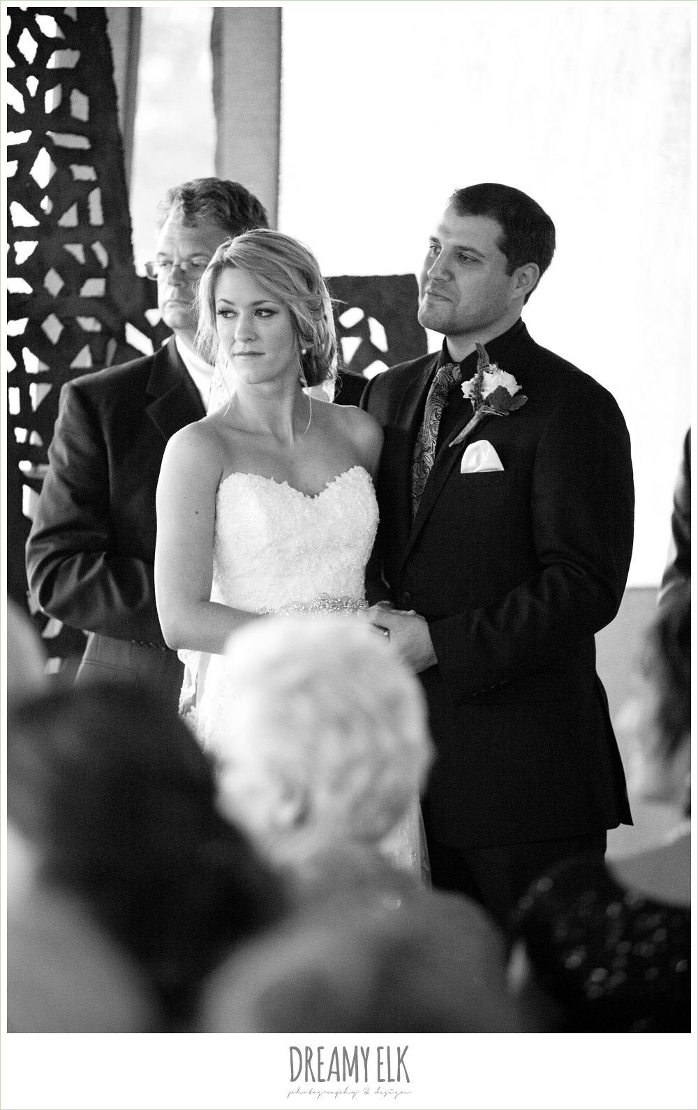 bride and groom during the ceremony, rainy fall wedding, rock lake ranch, dreamy elk photography and design