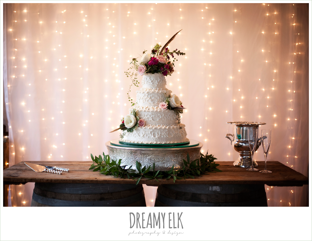 wedding cake, pheasant feathers, white ranunculus, fall wedding, rock lake ranch, dreamy elk photography and design