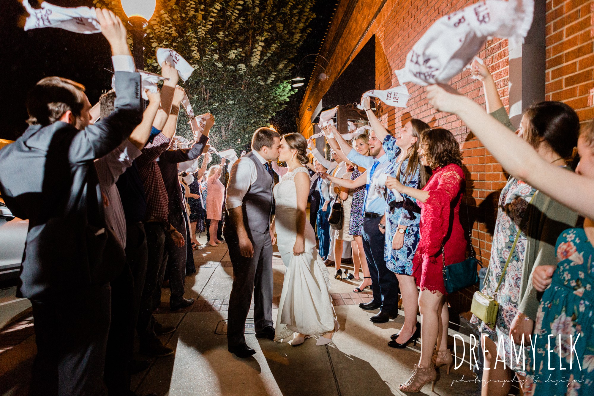 bride and groom send off twelfth man towel, wedding reception, ashley and company, downtown 202, spring wedding photo college station texas, dreamy elk photography and design