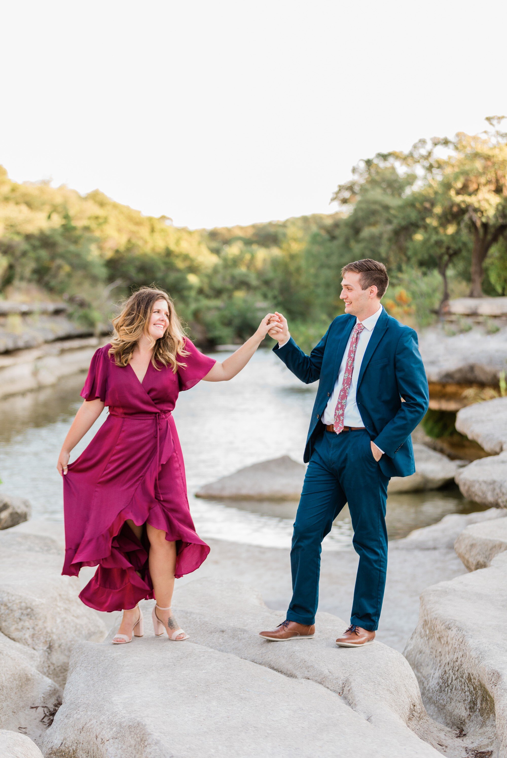 bull creek park austin texas engagement photo, burgundy dress and suit