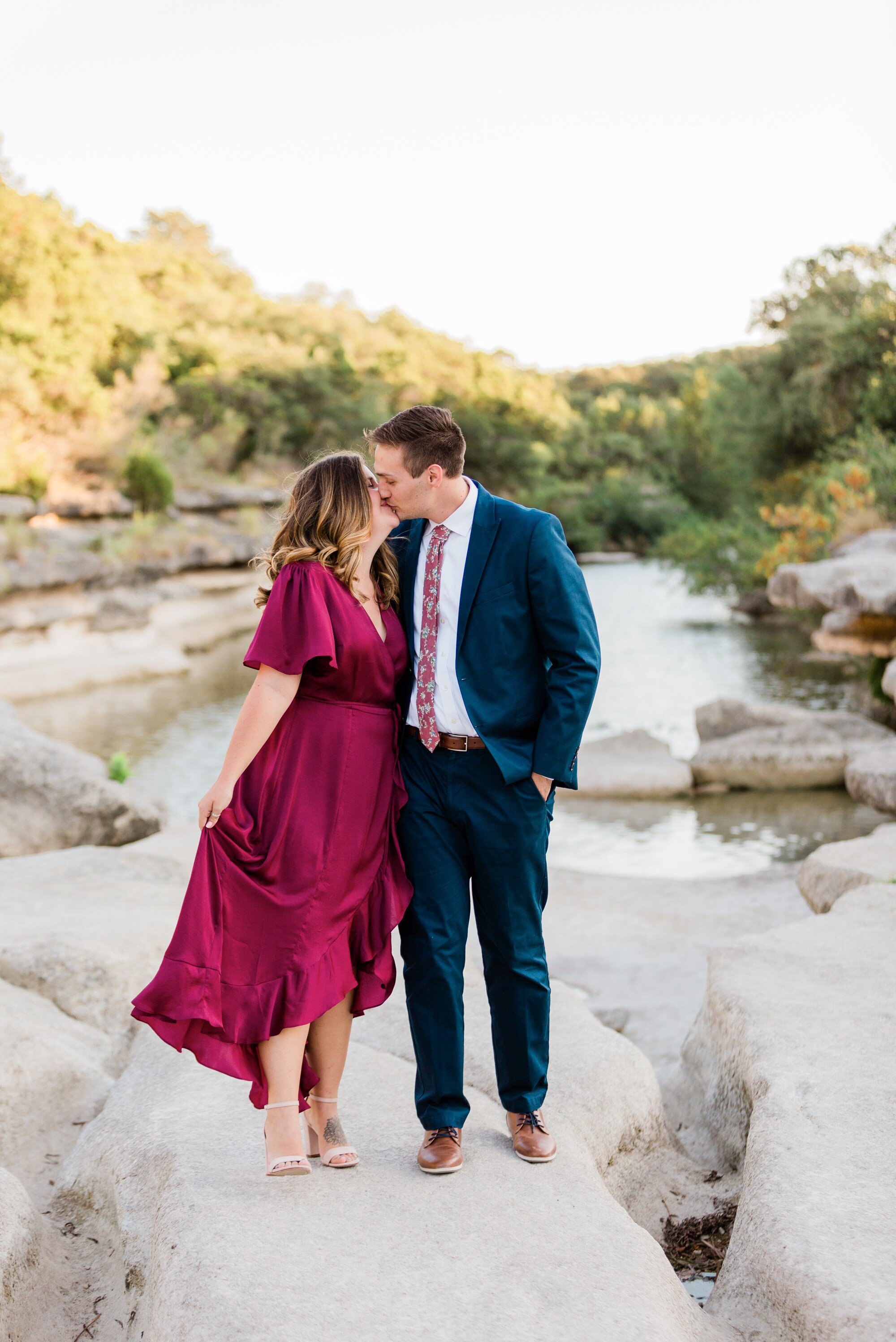 bull creek park austin texas engagement photo, burgundy dress and suit