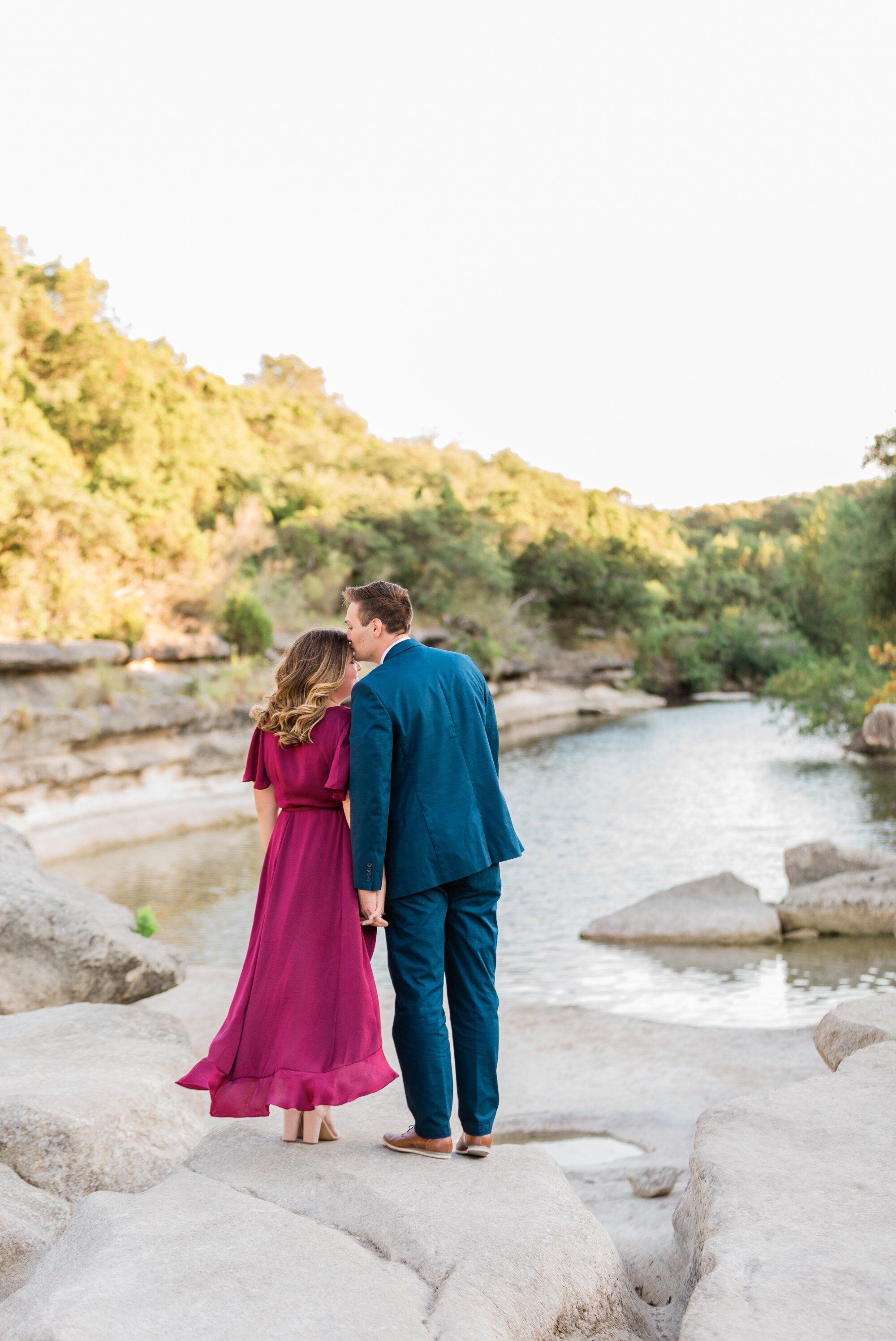 bull creek park austin texas engagement photo, burgundy dress and suit