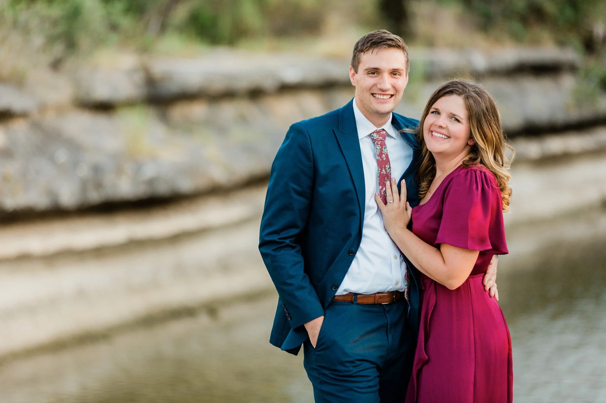 bull creek park austin texas engagement photo, burgundy dress and suit
