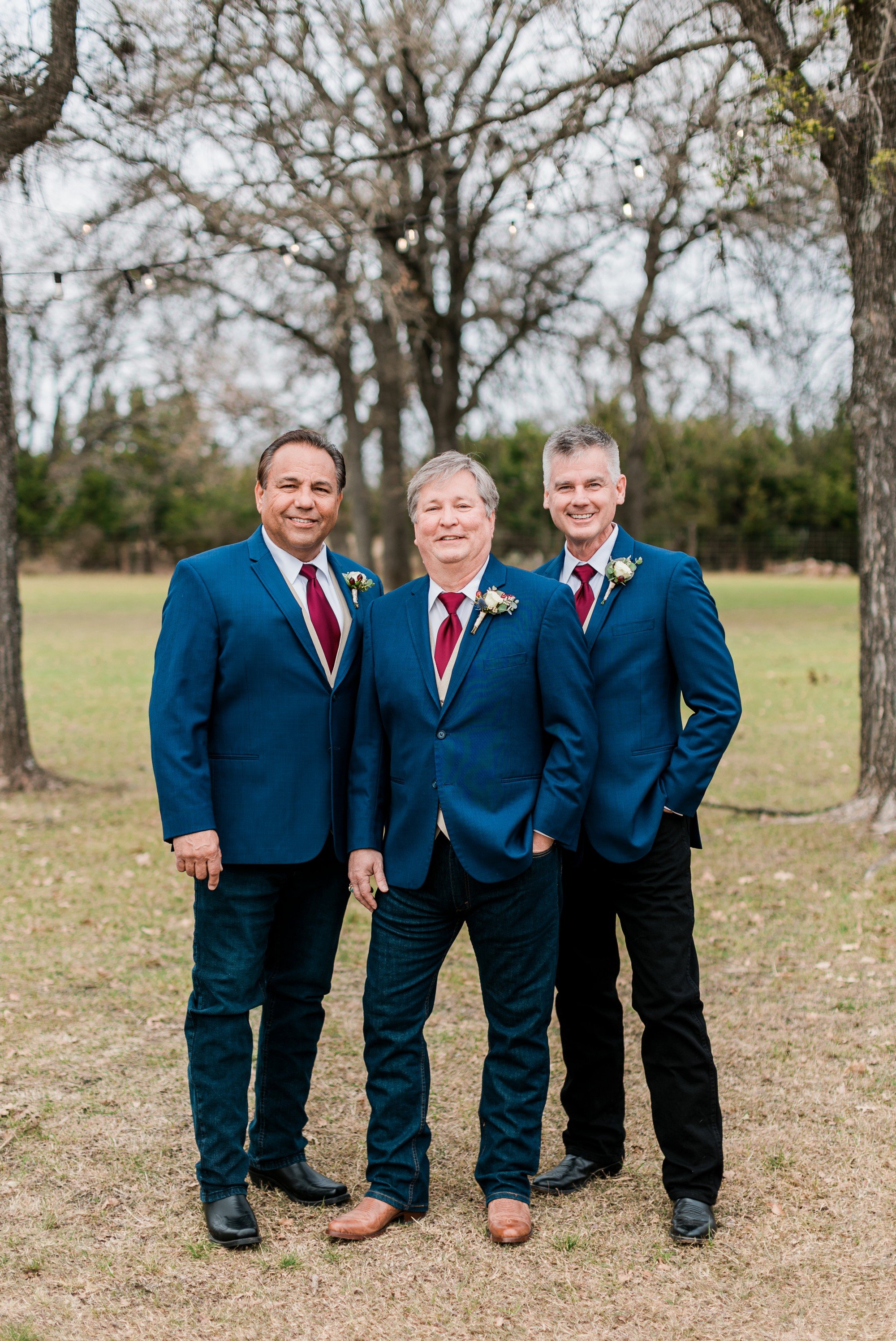 groom and groomsmen in navy suit