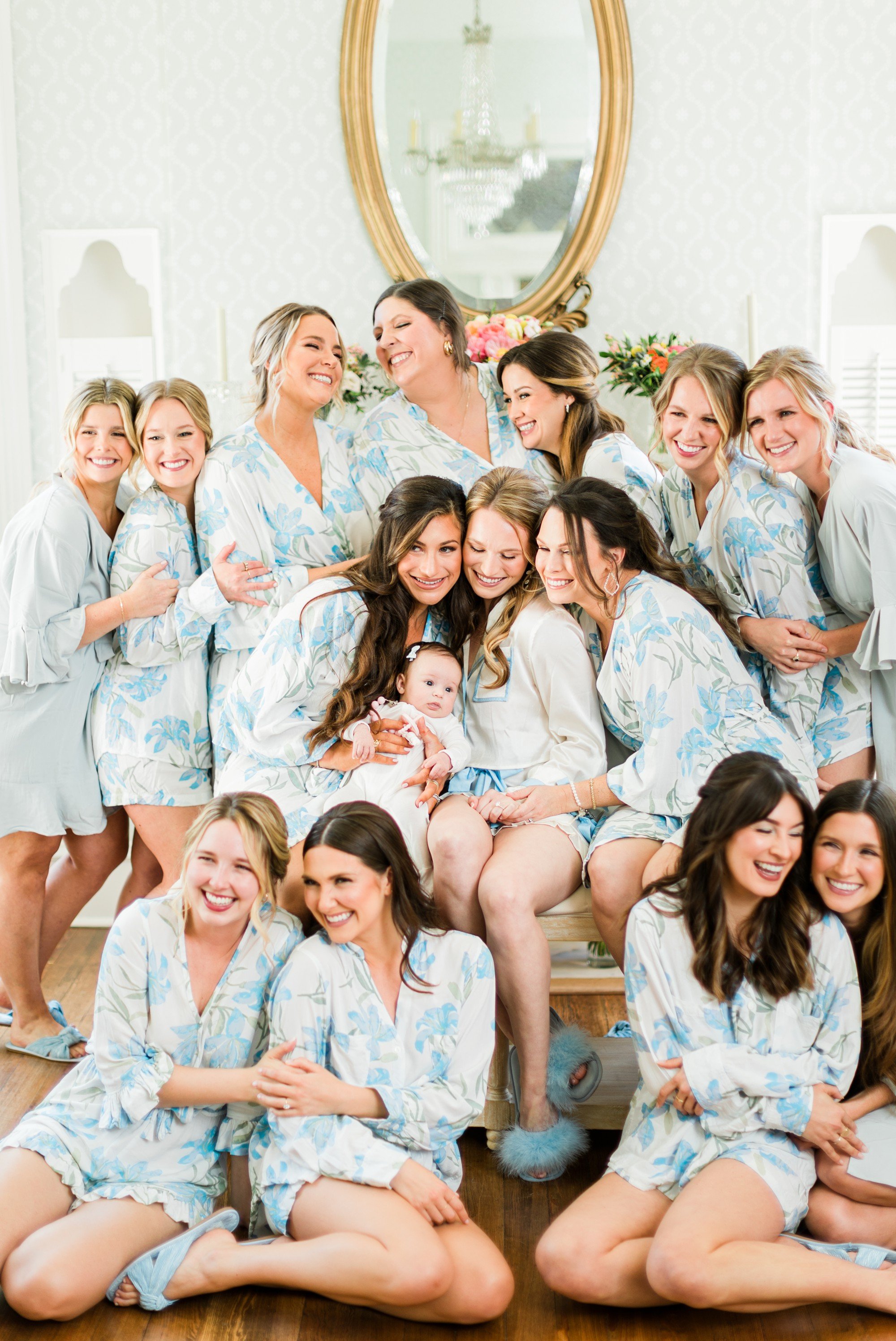 bridesmaids in matching blue and white pjs