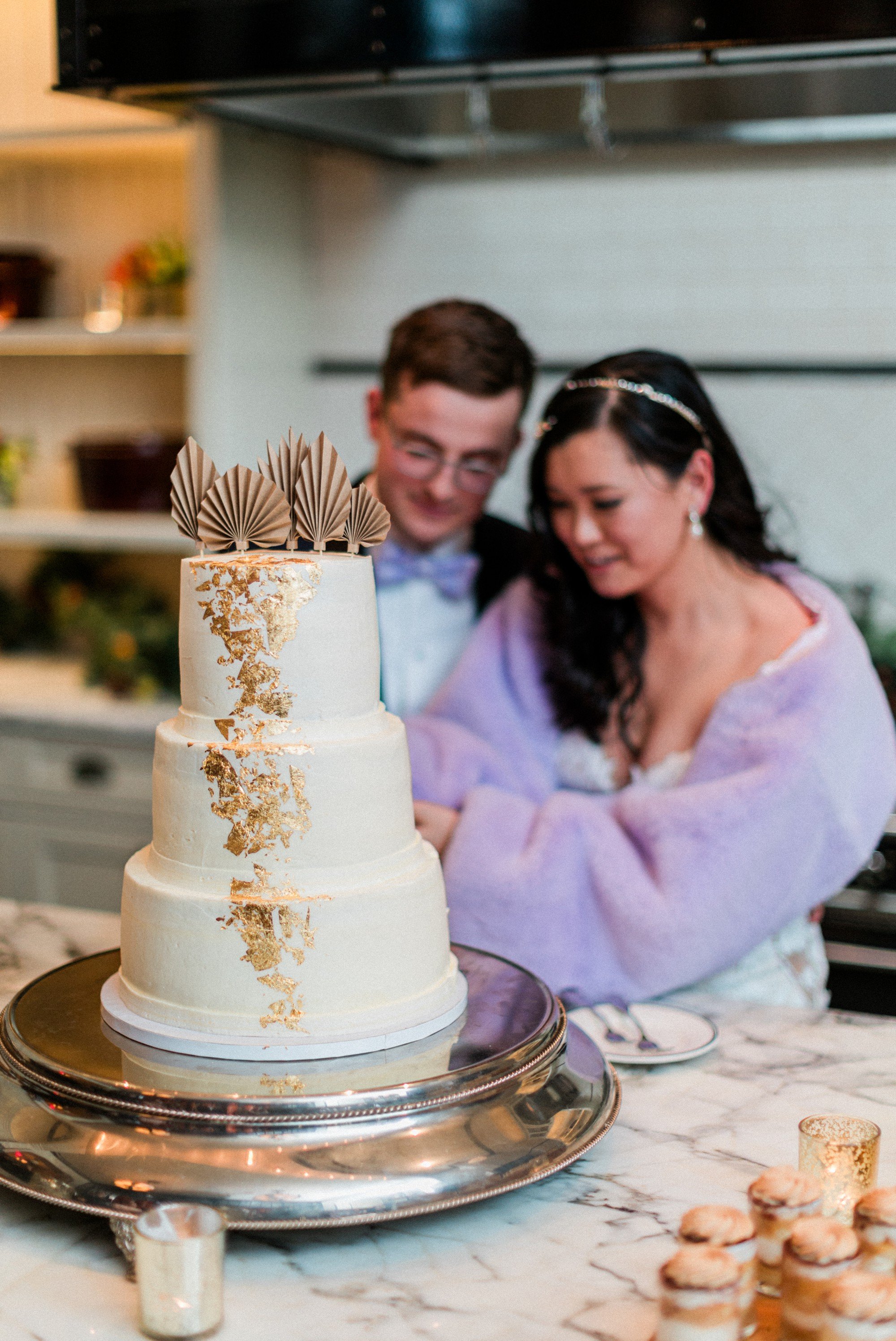 wedding cake with gold leaf