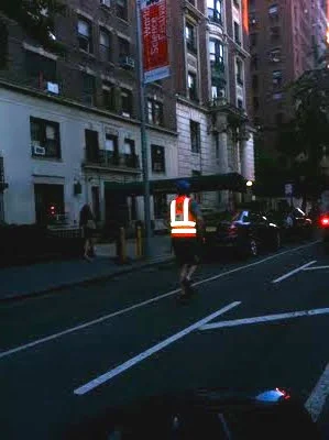 this guy has a gas mask on and is running to stop the War on Drugs- it says so on his vest