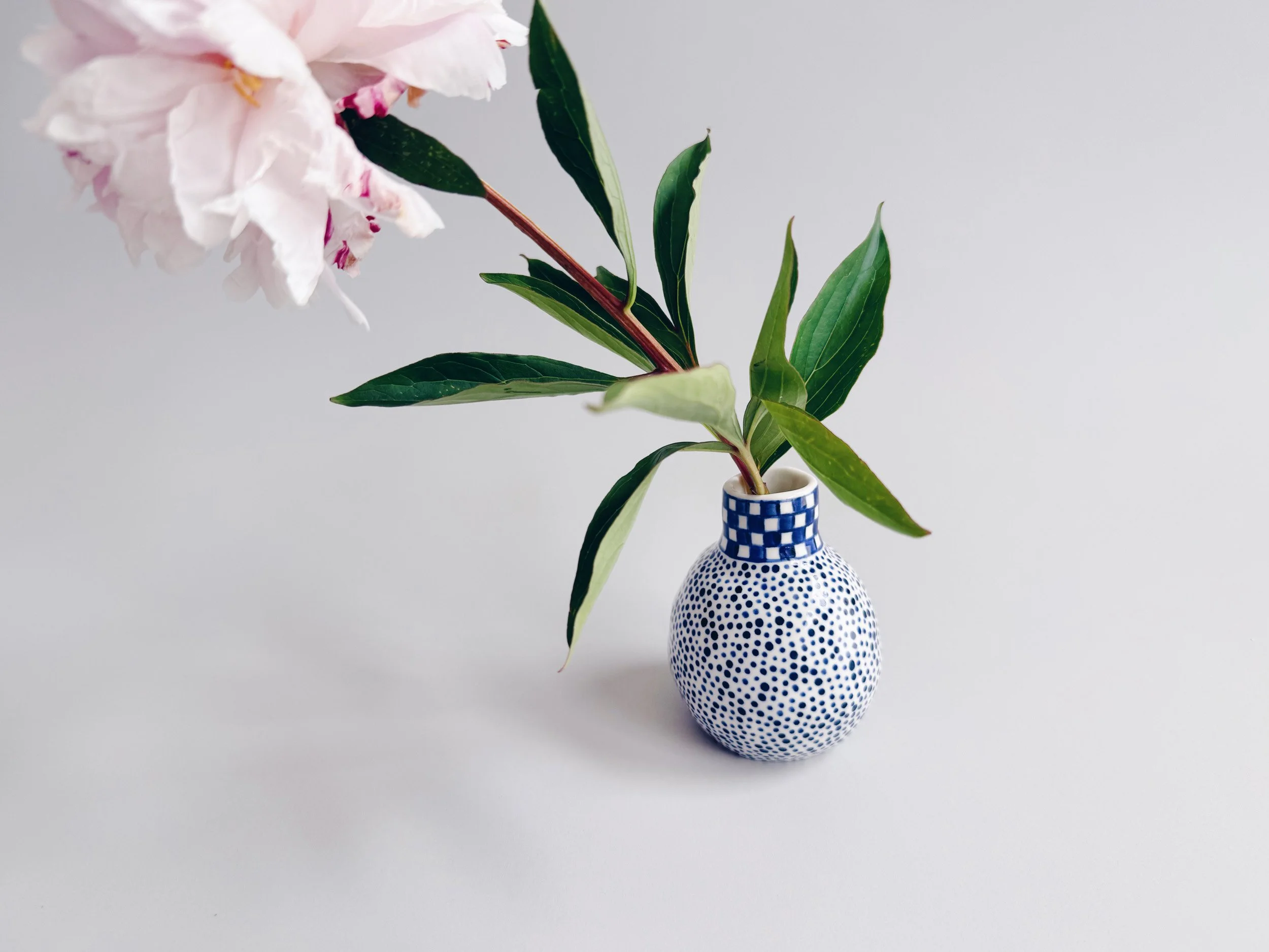 Blue and white, handmade ceramic vase.