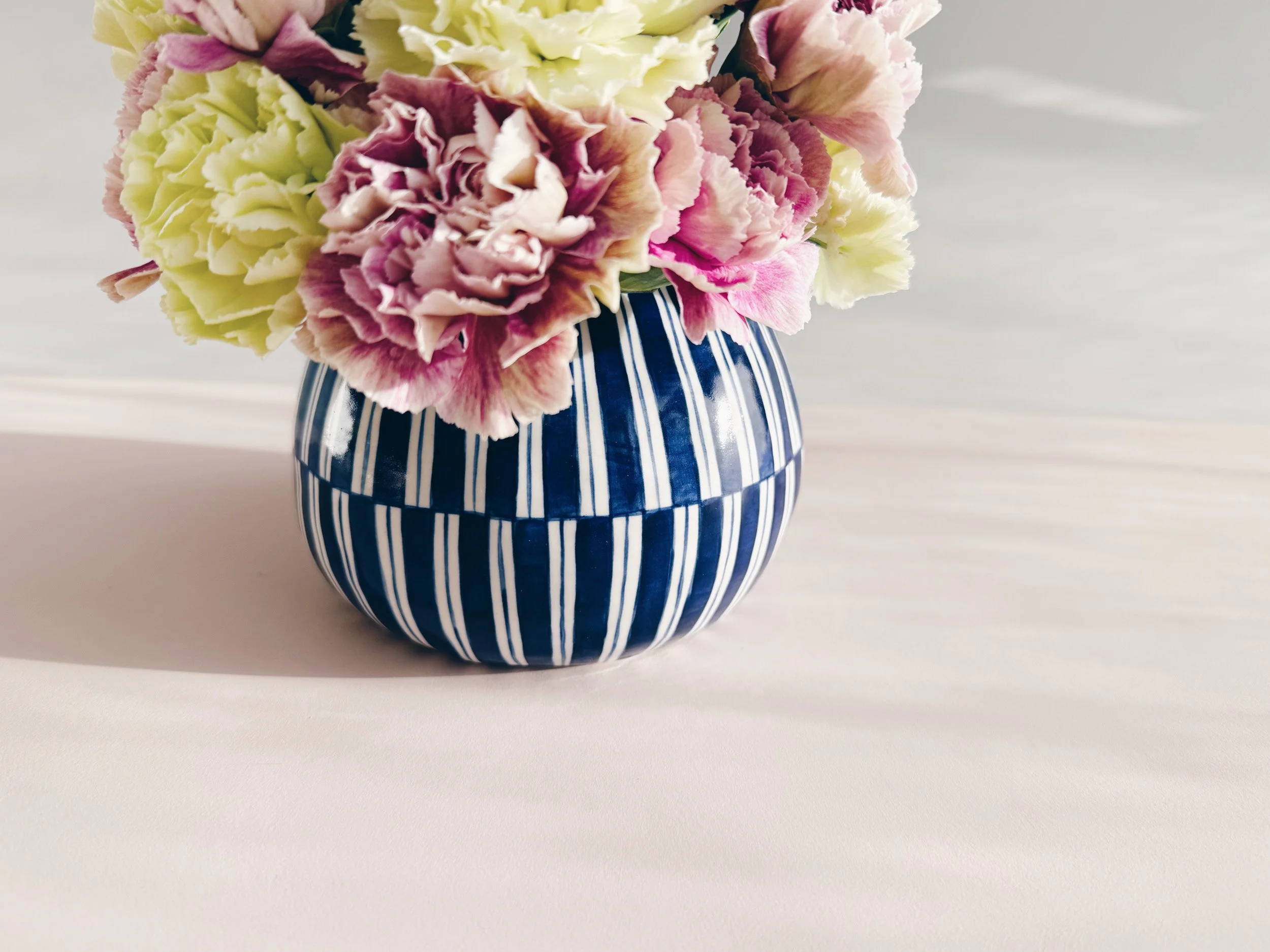 Blue and white, handmade ceramic vase.