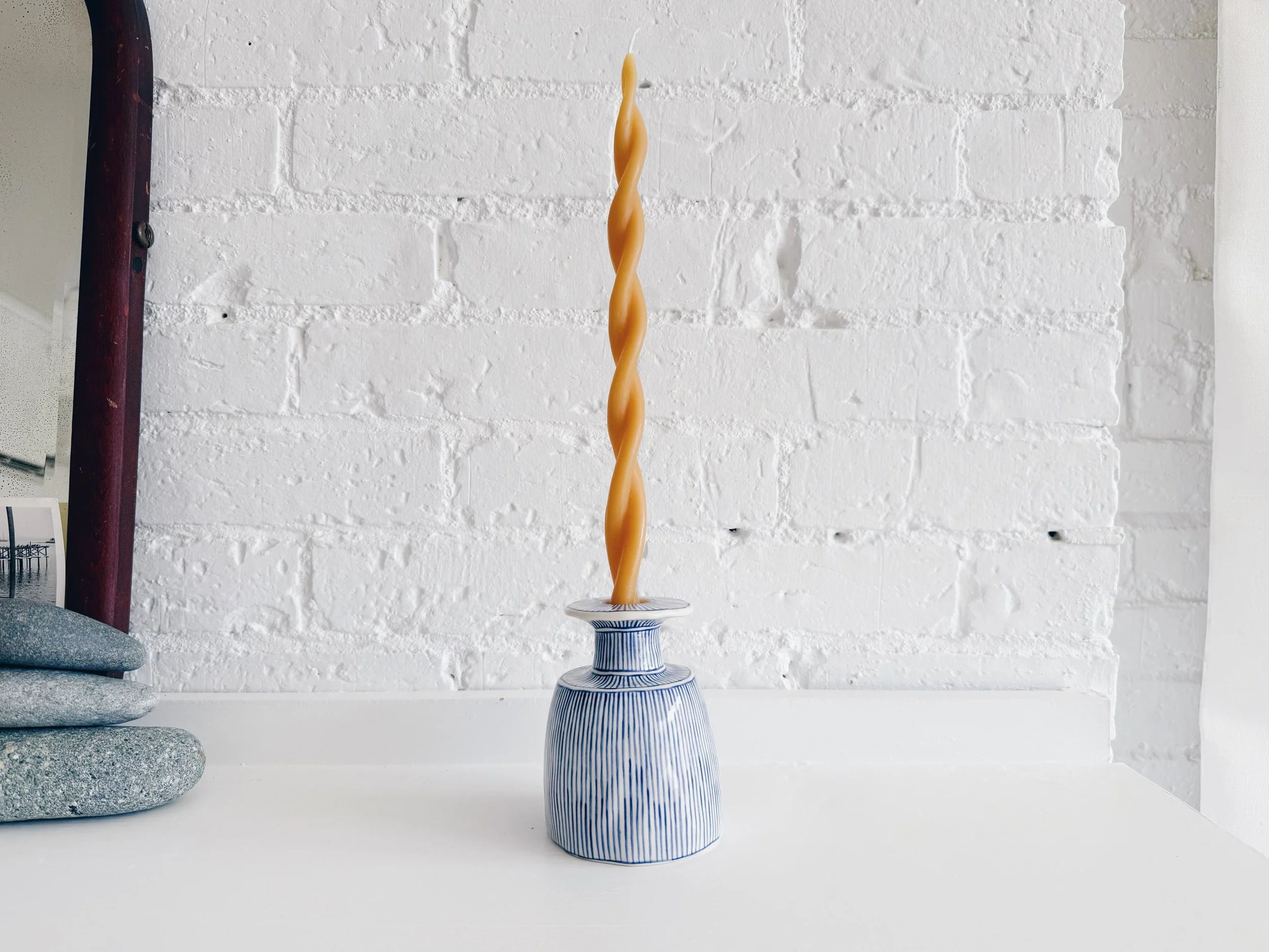 Blue and white, handmade ceramic candleholder.