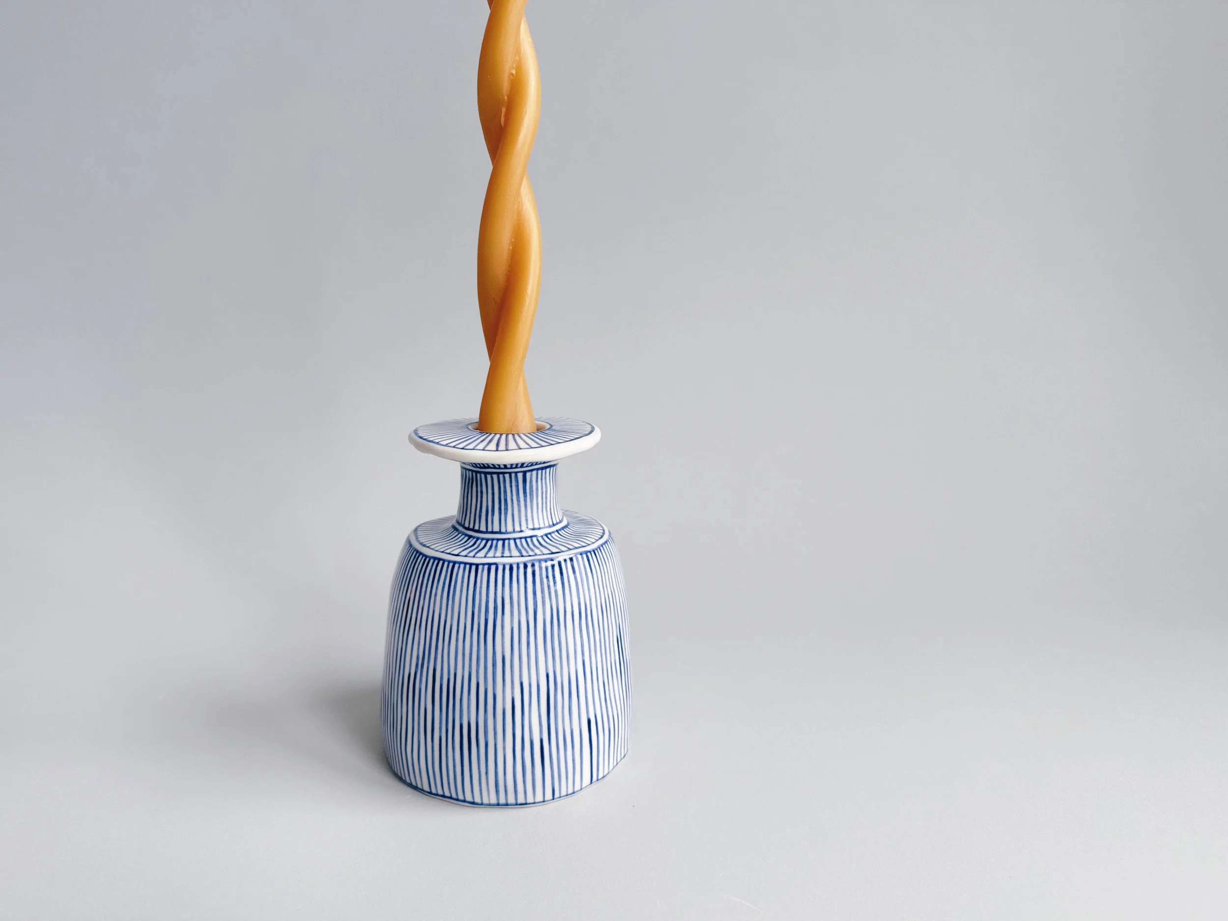 Blue and white, handmade ceramic candleholder.