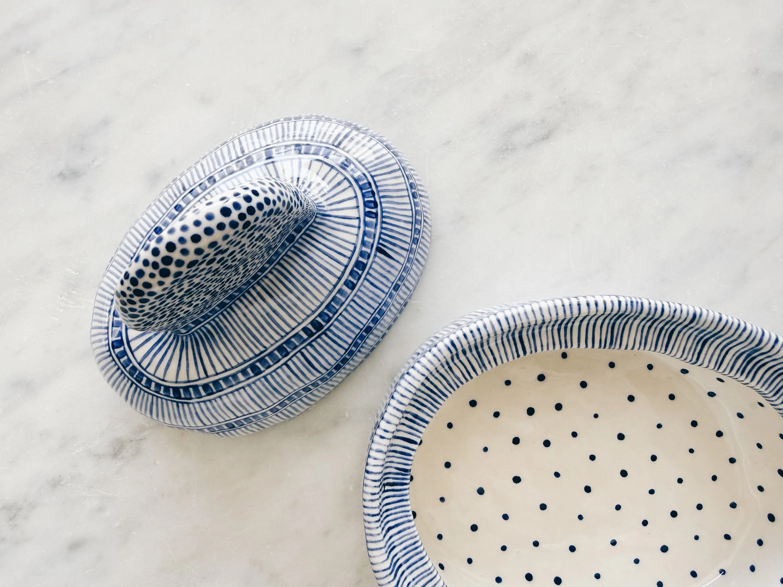 Blue and white, handmade ceramic jar.