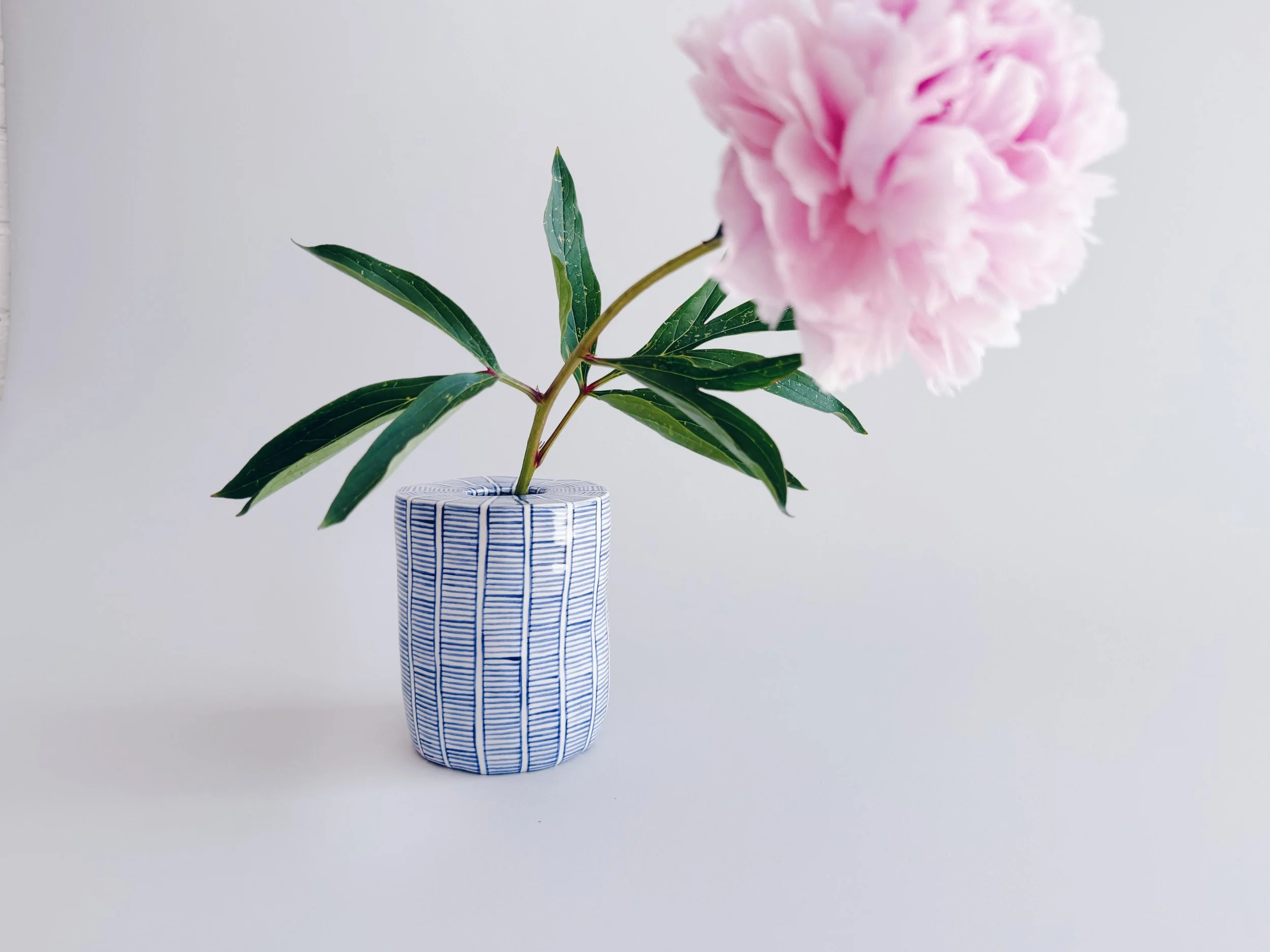 Blue and white, handmade ceramic vase.