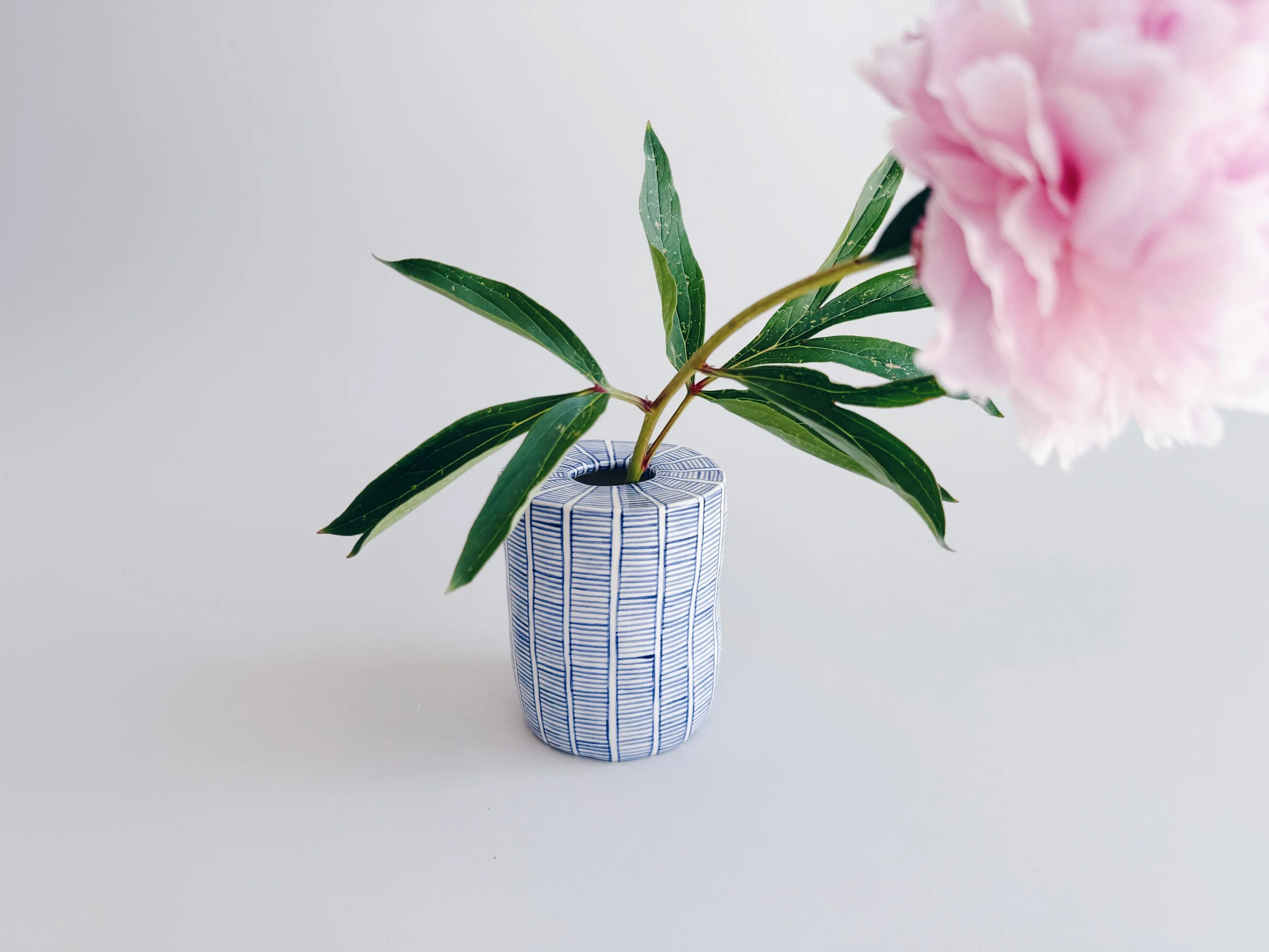 Blue and white, handmade ceramic vase.