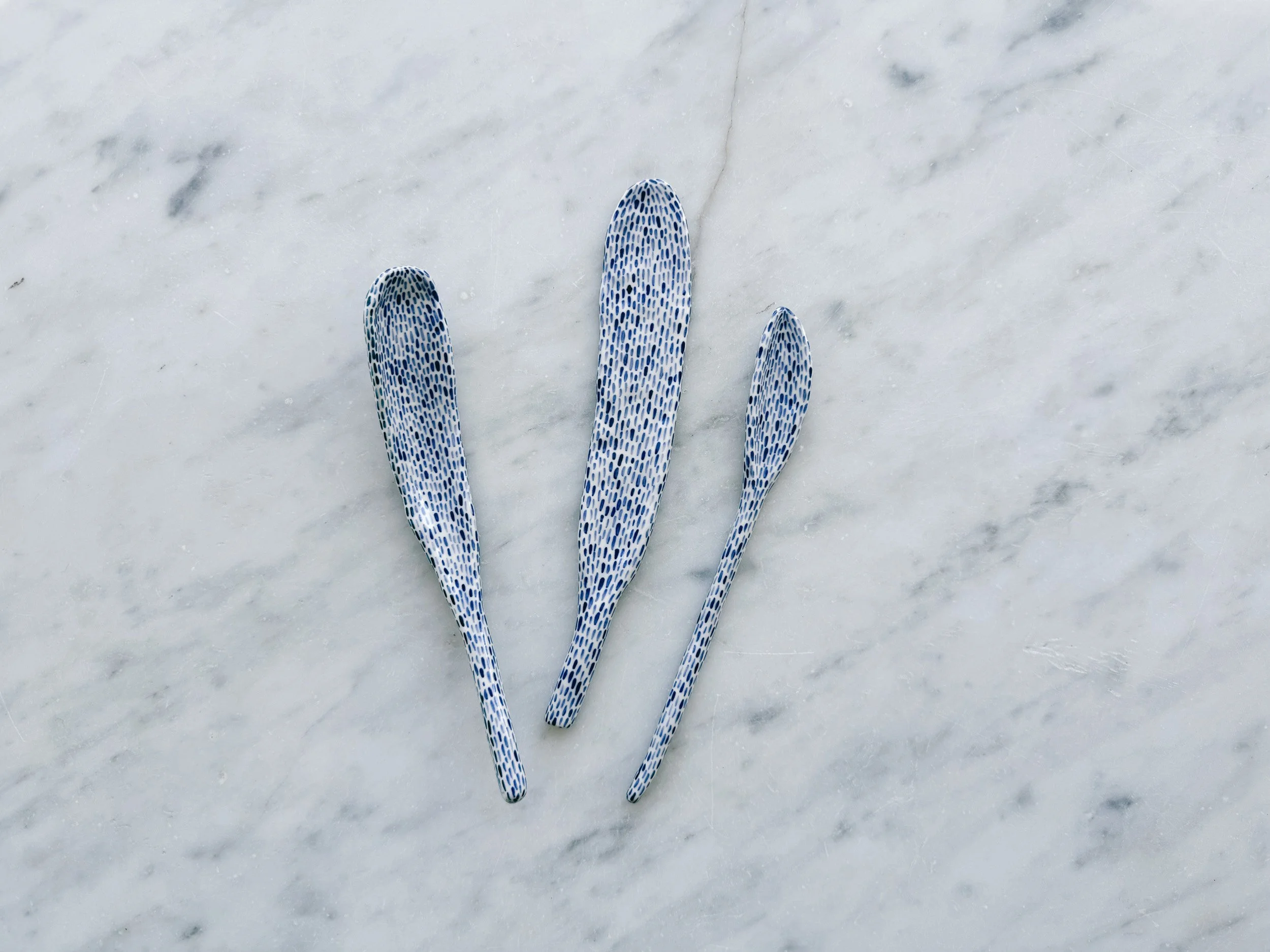 Blue and white, handmade ceramic sculpture.