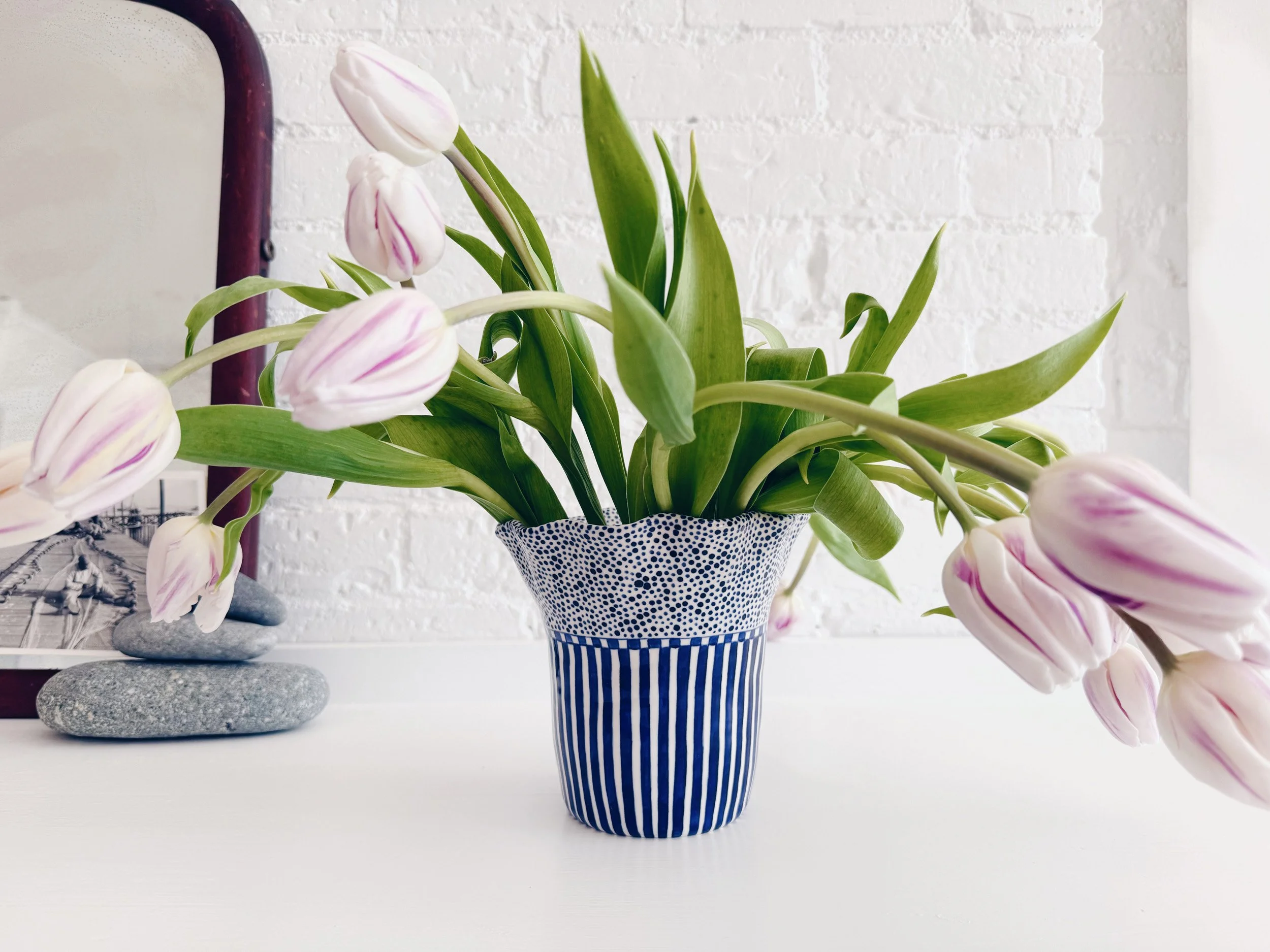 Blue and white, handmade ceramic vase.