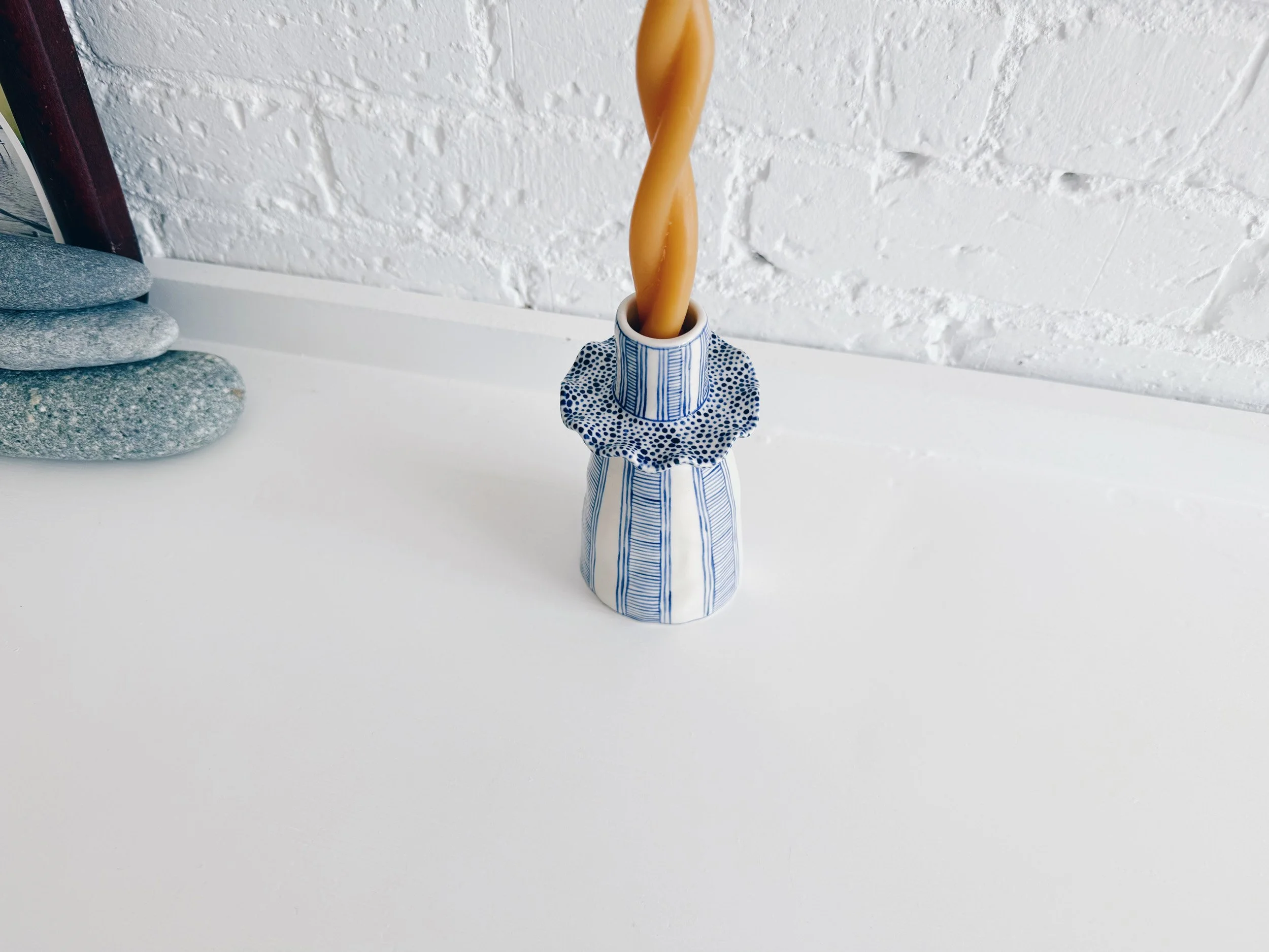 Blue and white, handmade ceramic candleholder.