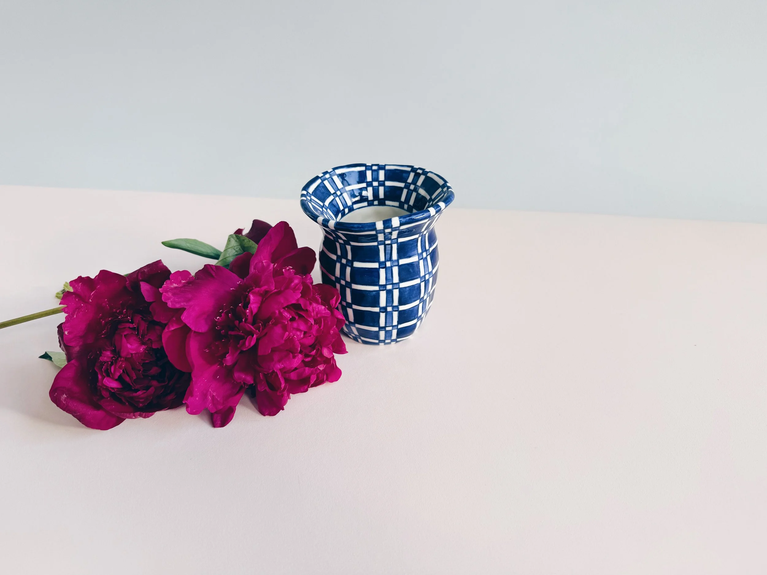 Blue and white, handmade ceramic vase.