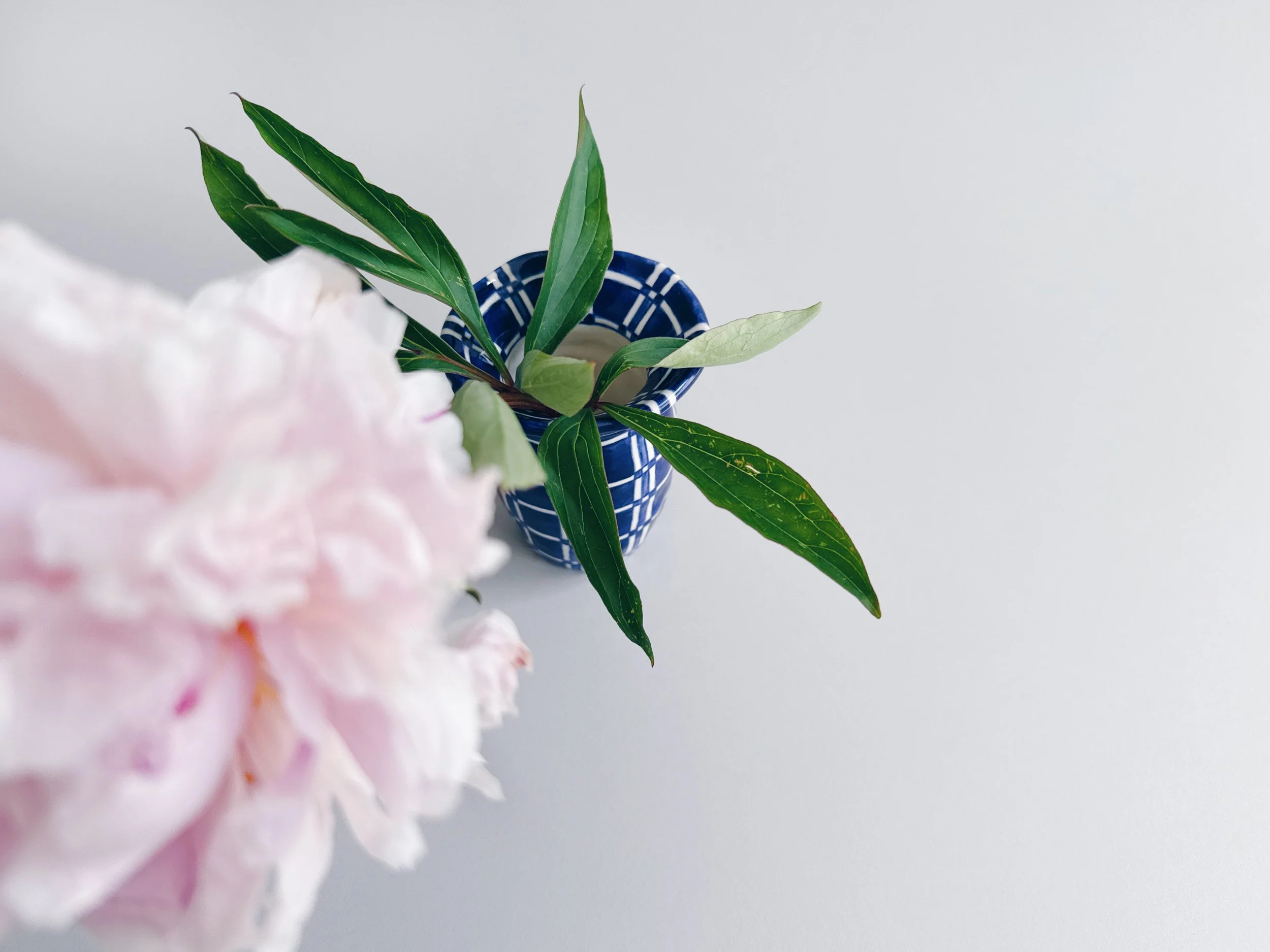 Blue and white, handmade ceramic vase.