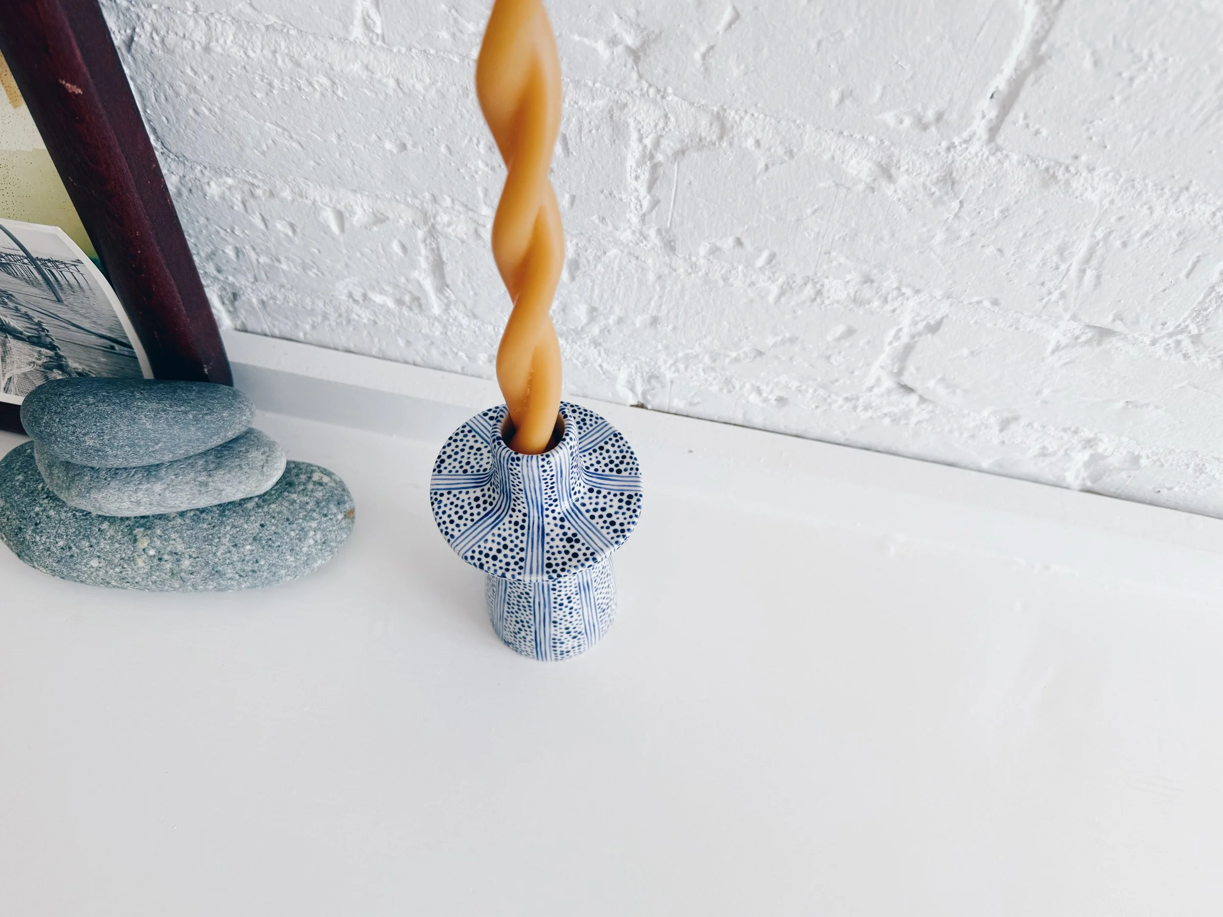Blue and white, handmade ceramic candleholder.