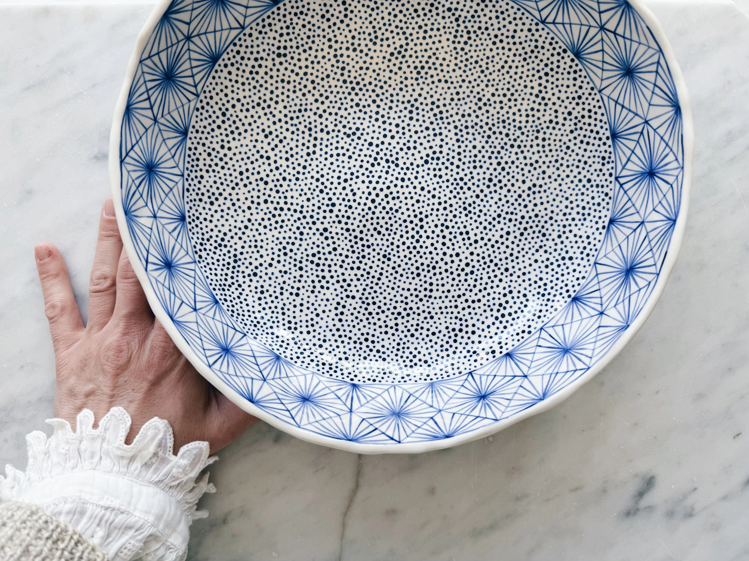 Blue and white, handmade ceramic bowl.