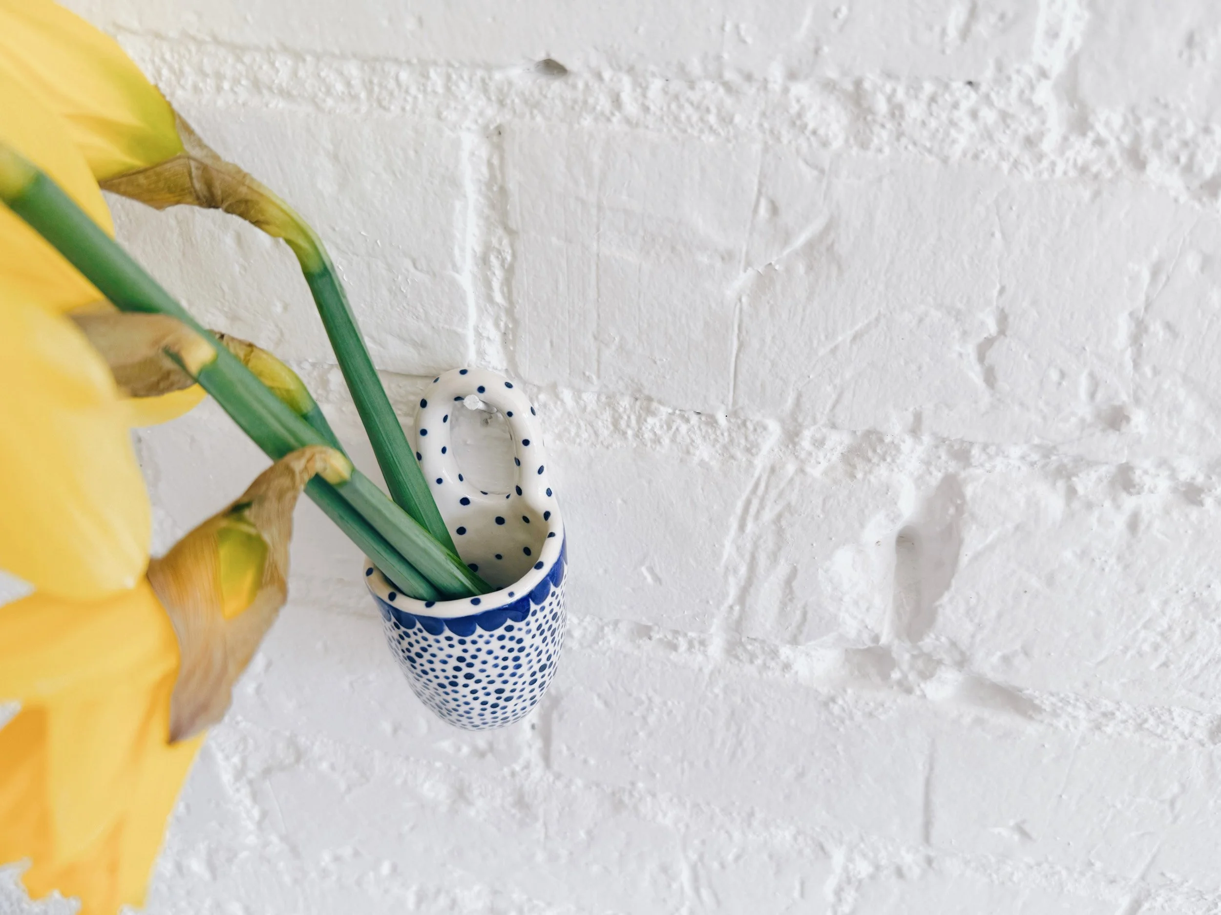 Blue and white, handmade ceramic vessel.