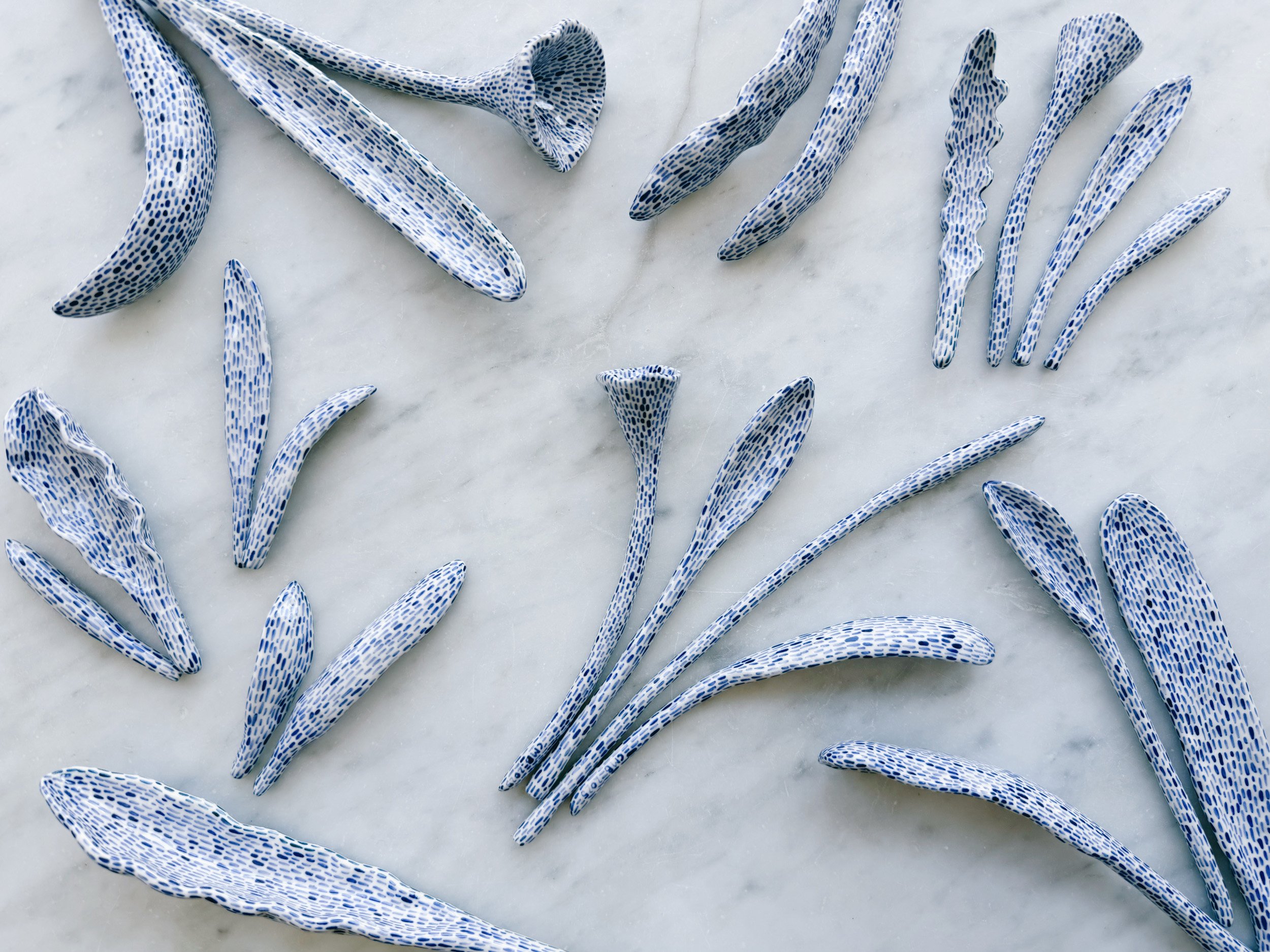 Blue and white, handmade ceramic sculpture.