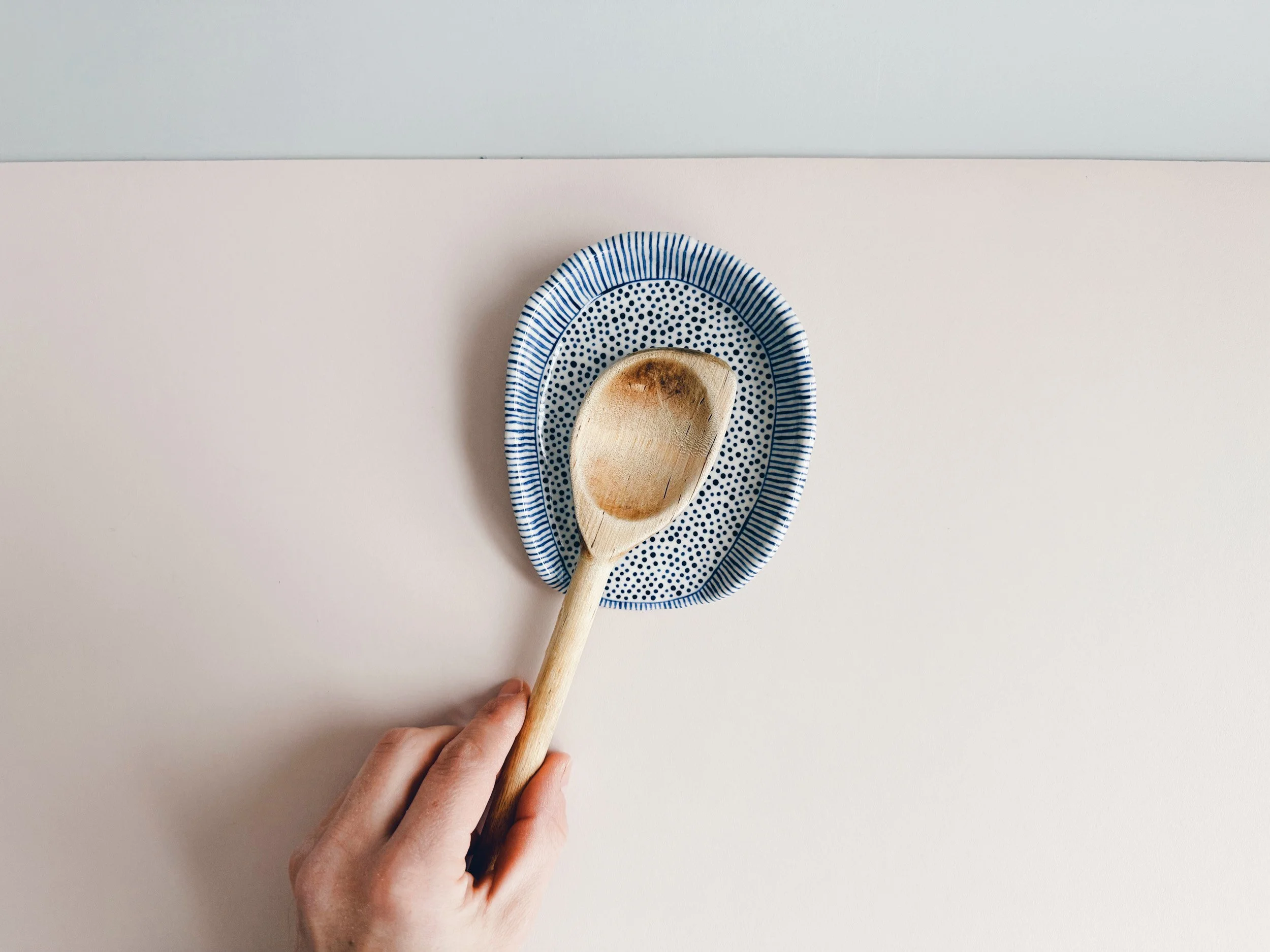 Blue and white, handmade ceramic spoon rest.