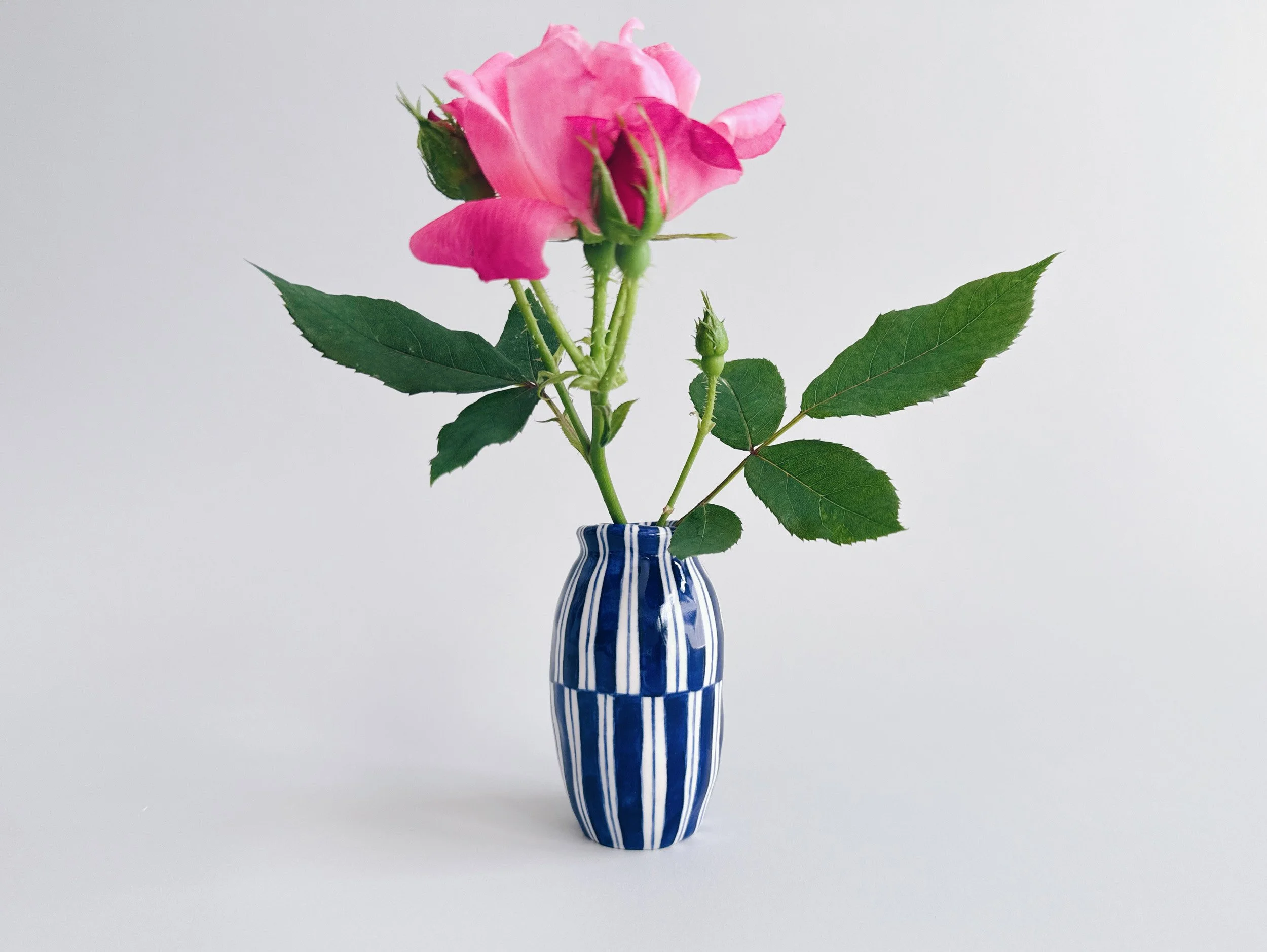 Blue and white, handmade ceramic vase.