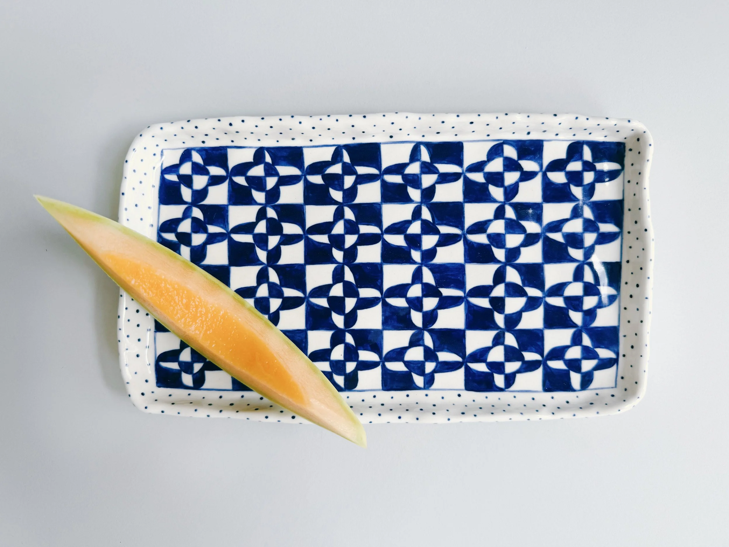 Blue and white, handmade ceramic plate.