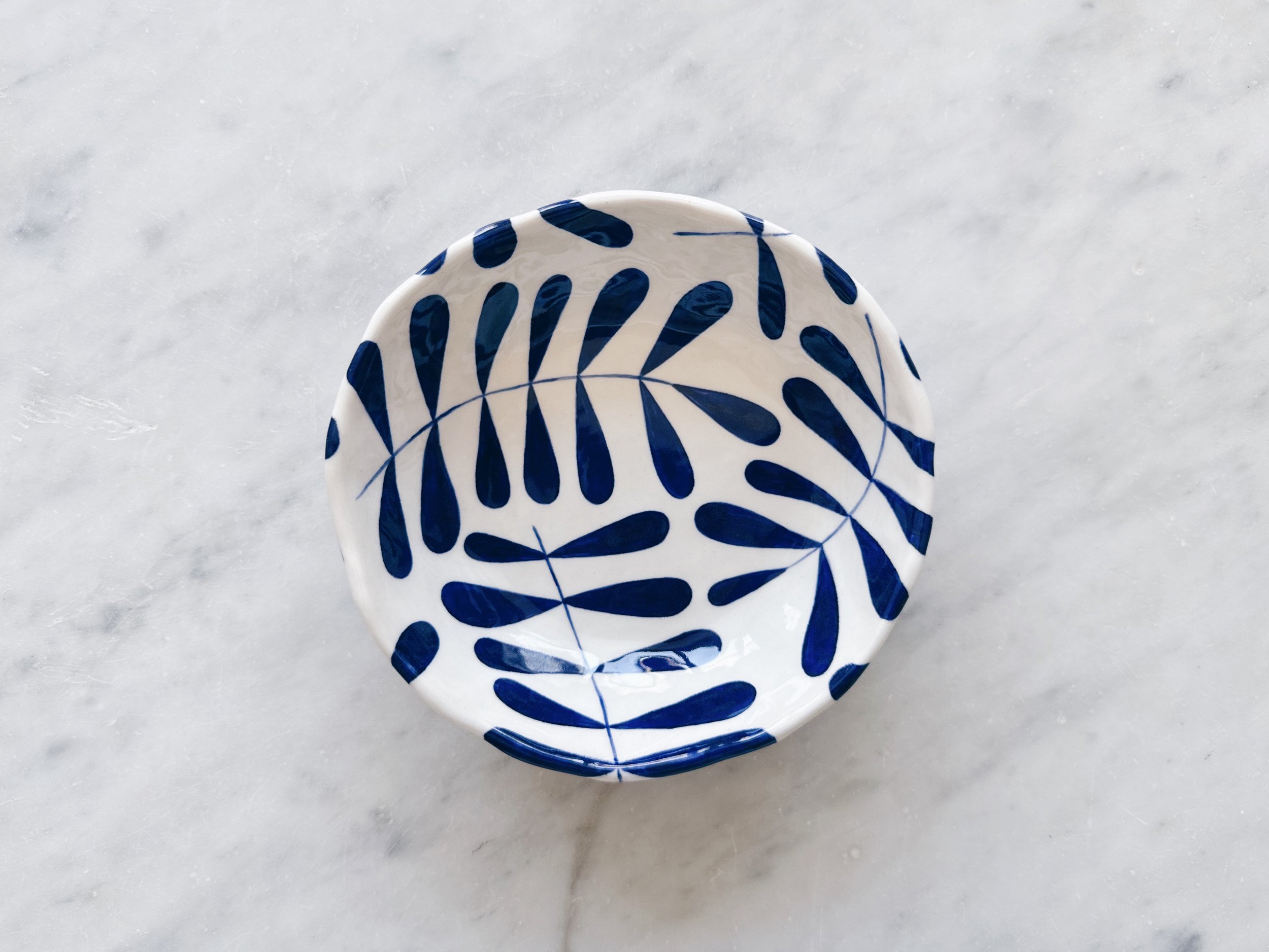 Blue and white, handmade ceramic bowl.