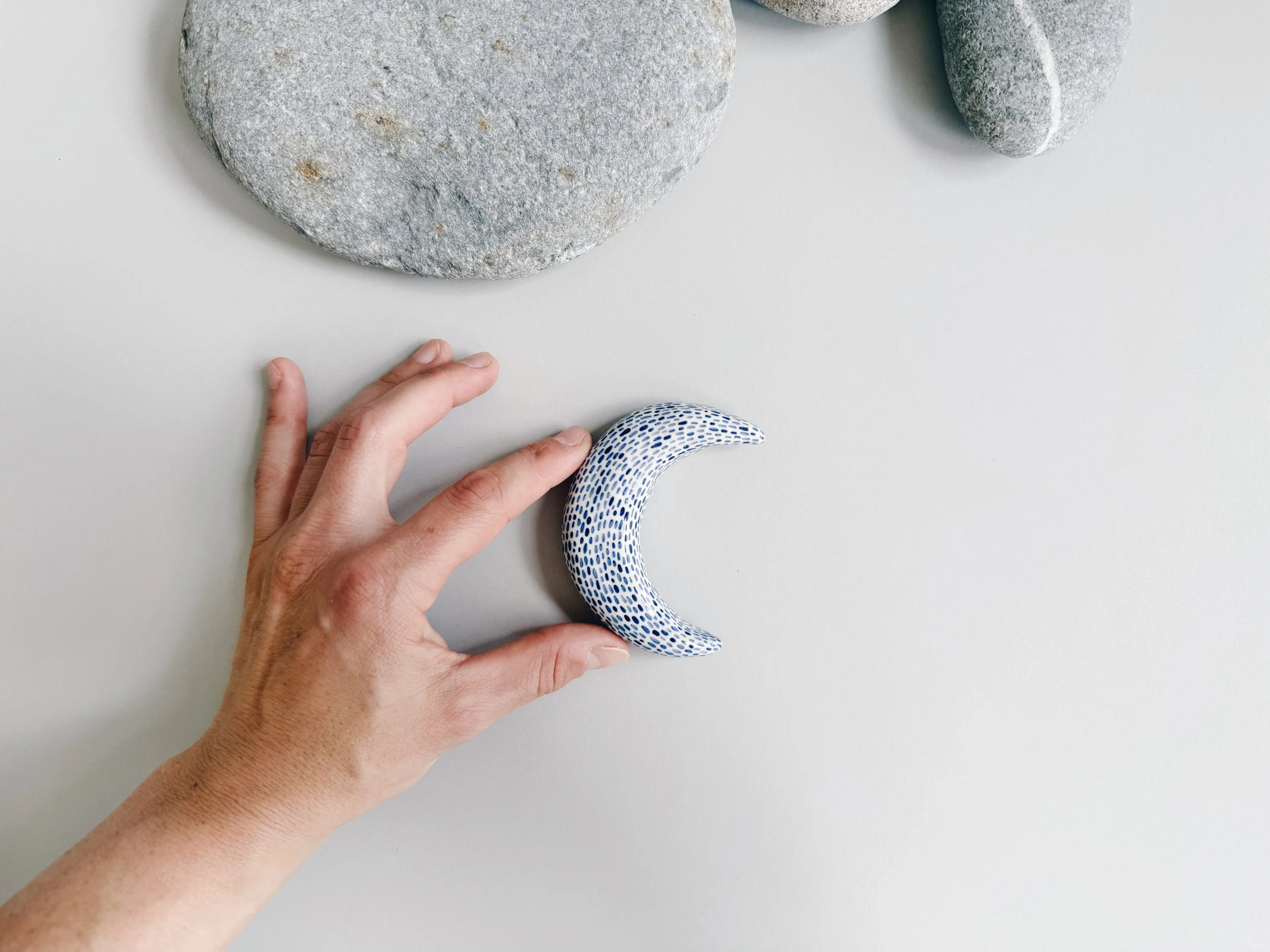 Blue and white, handmade ceramic moon