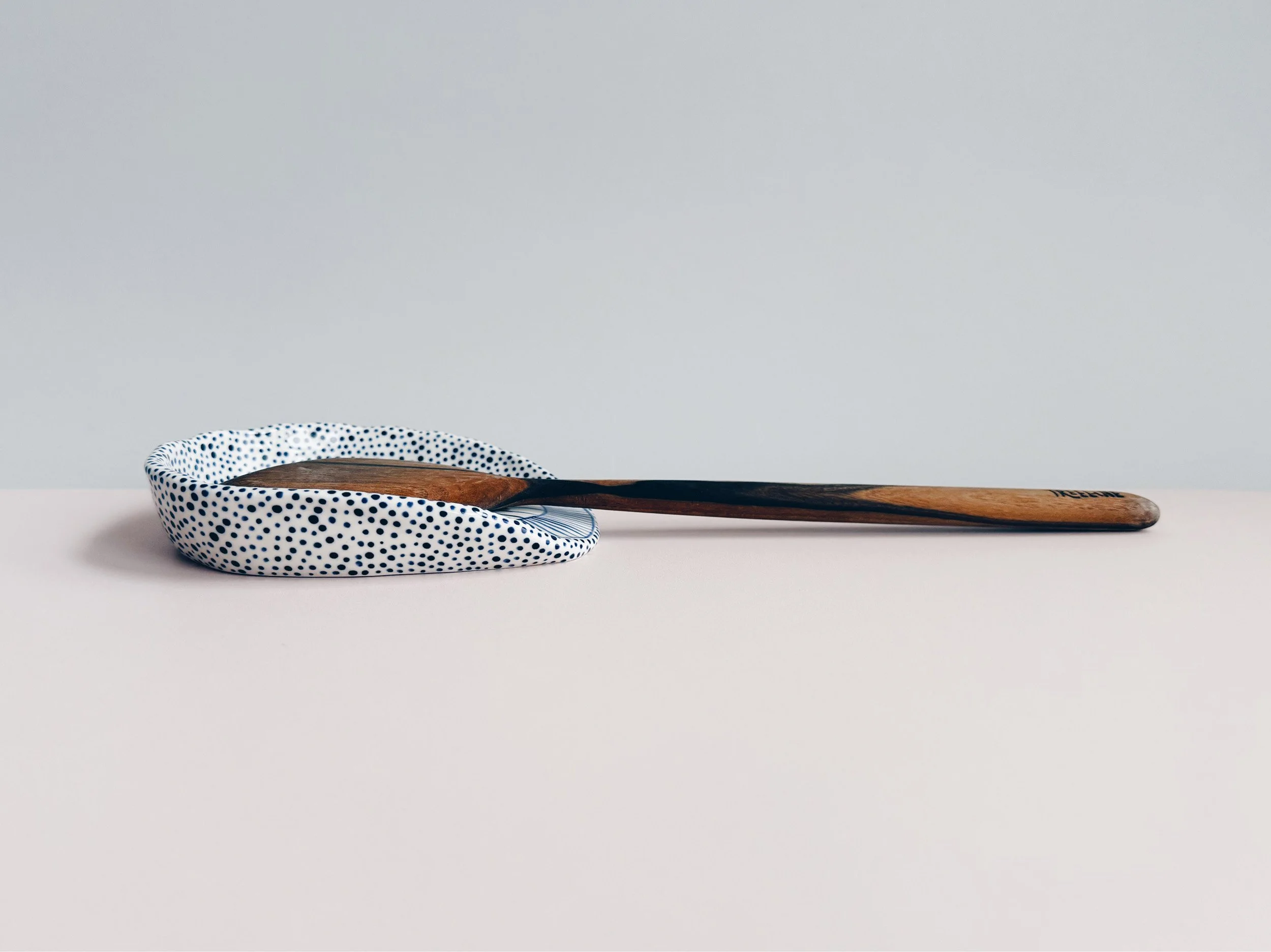 Blue and white, handmade ceramic spoon rest.