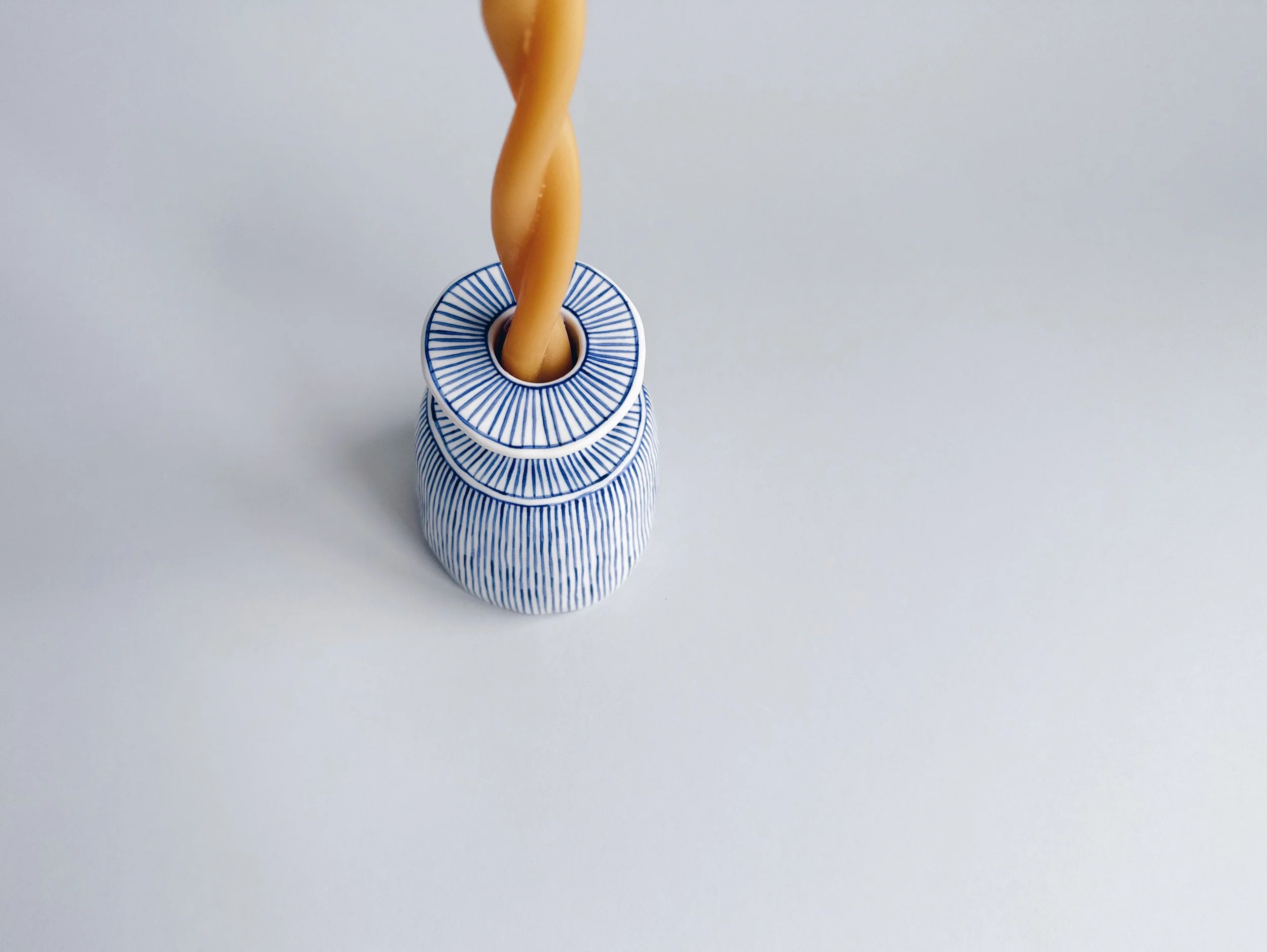 Blue and white, handmade ceramic candleholder.