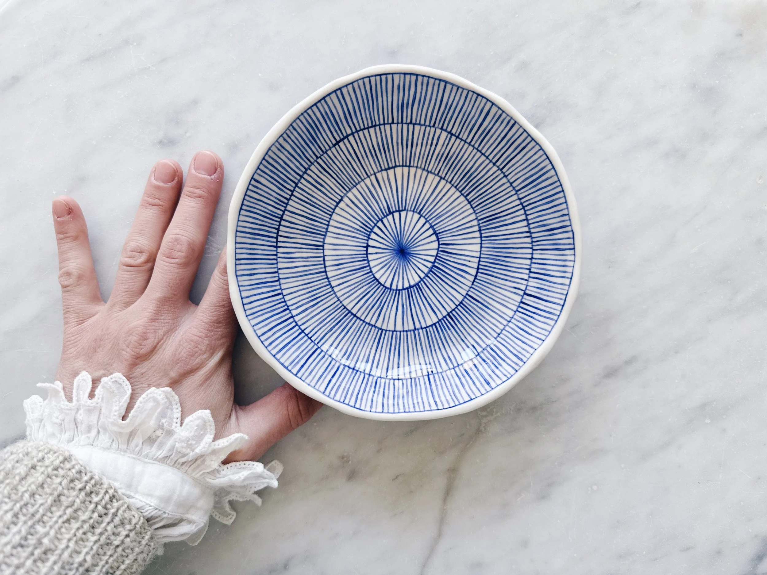 Blue and white, handmade ceramic bowl.