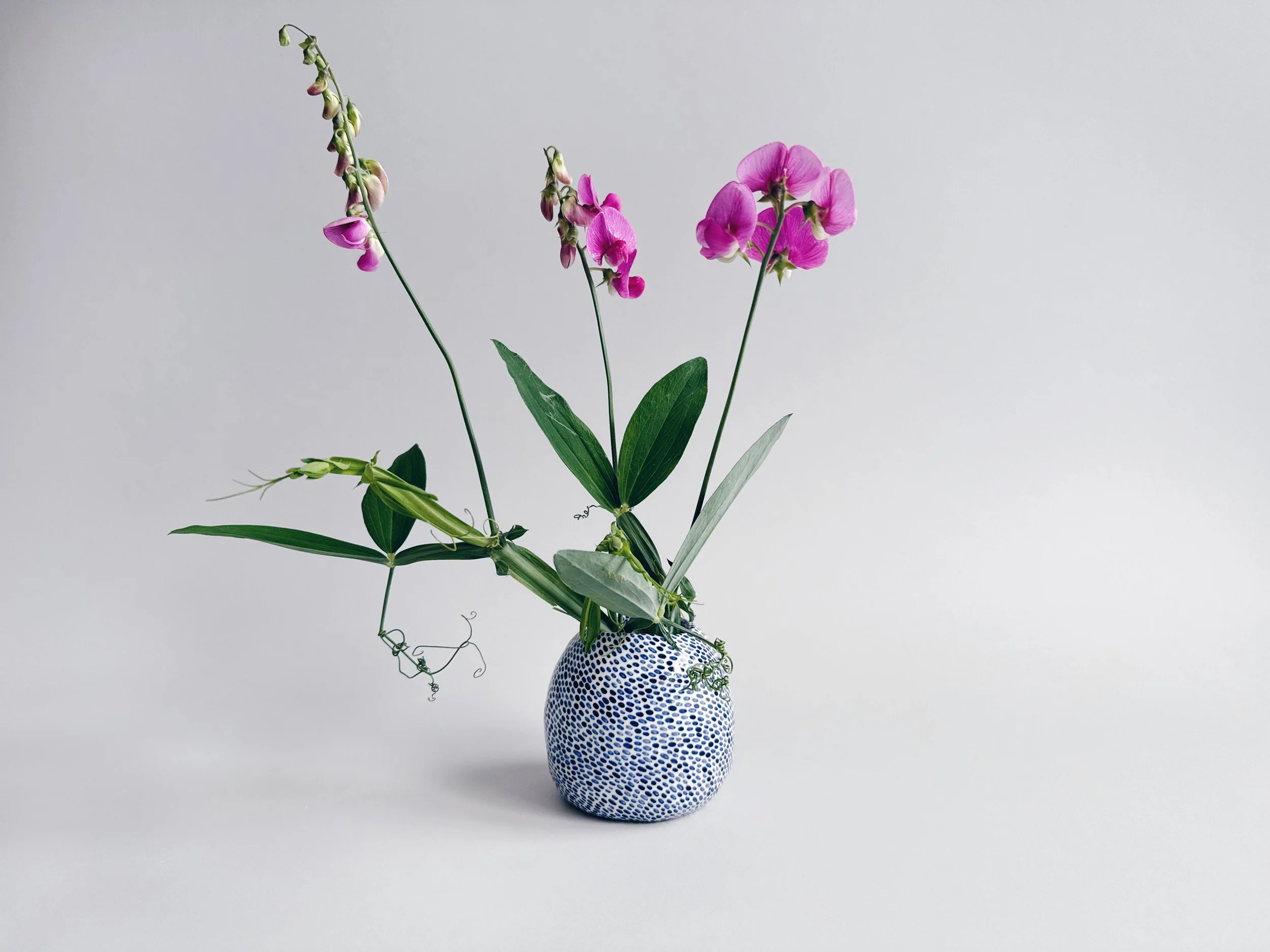 Blue and white, handmade ceramic vase.