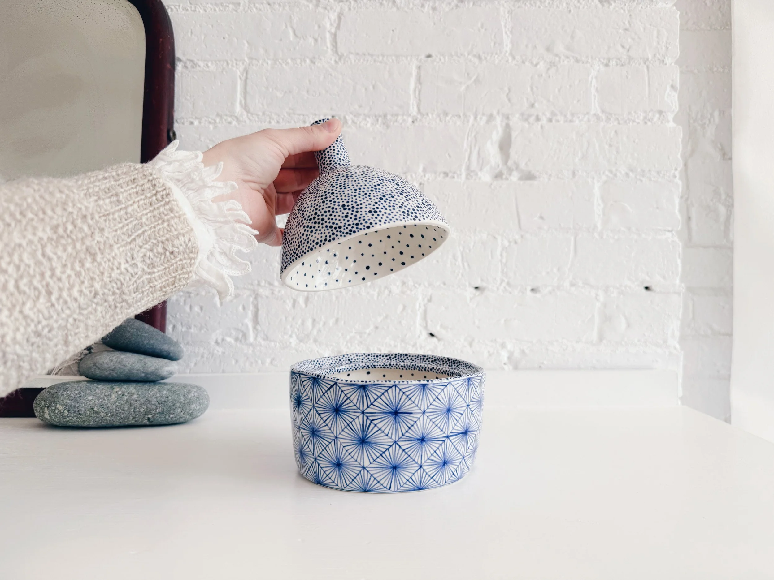 Blue and white, handmade ceramic jar.