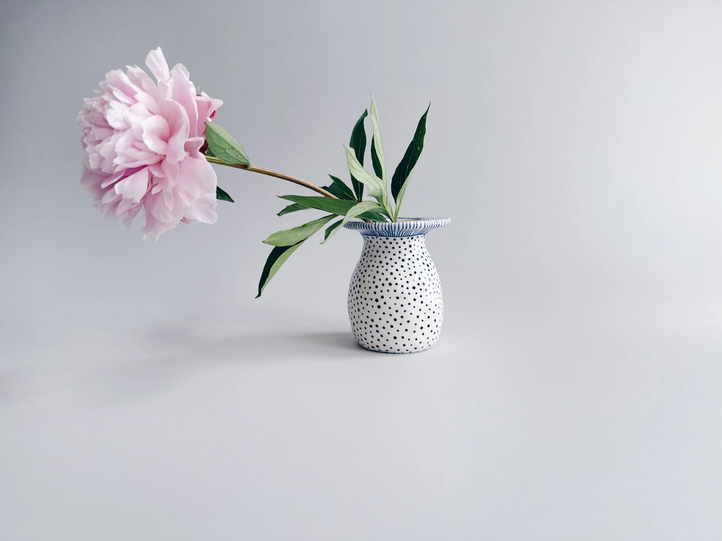 Blue and white, handmade ceramic vase.