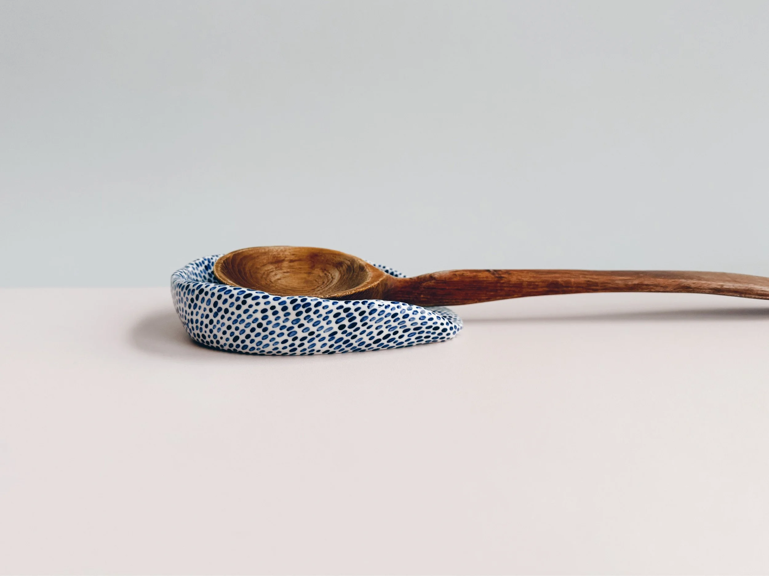 Blue and white, handmade ceramic spoon rest.