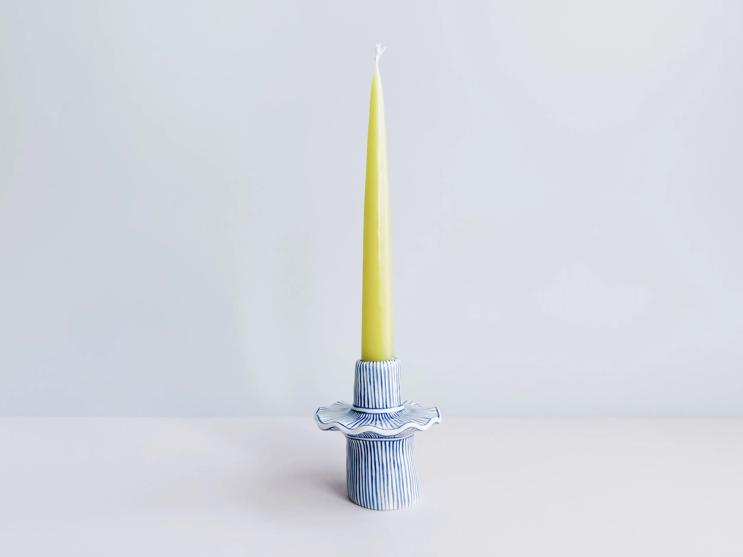 Blue and white, handmade ceramic candleholder.