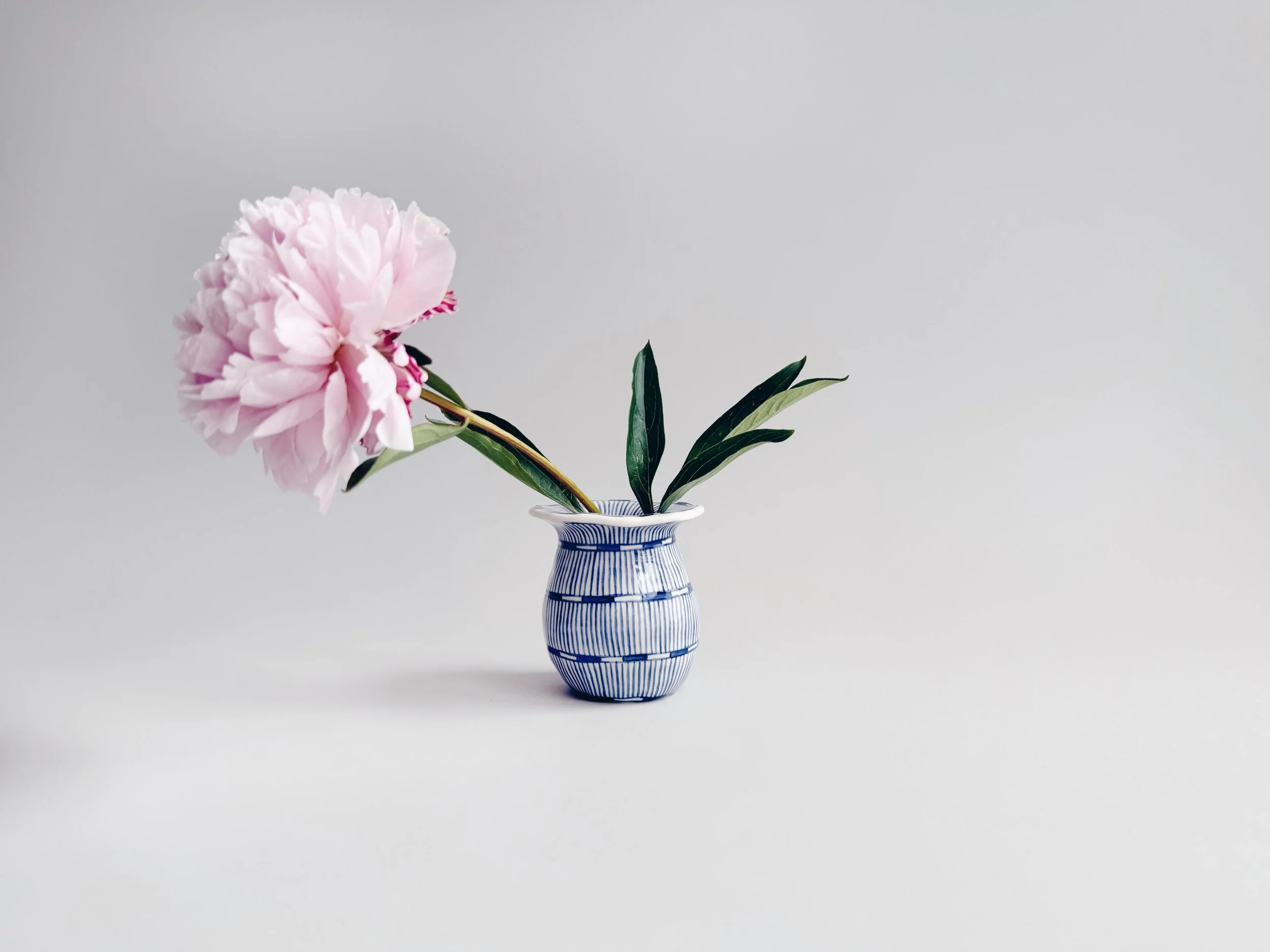 Blue and white, handmade ceramic vase.