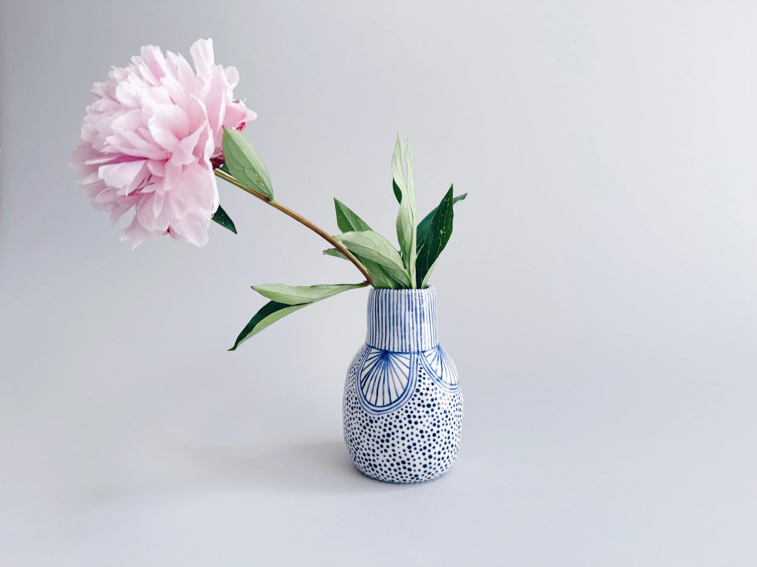 Blue and white, handmade ceramic vase.