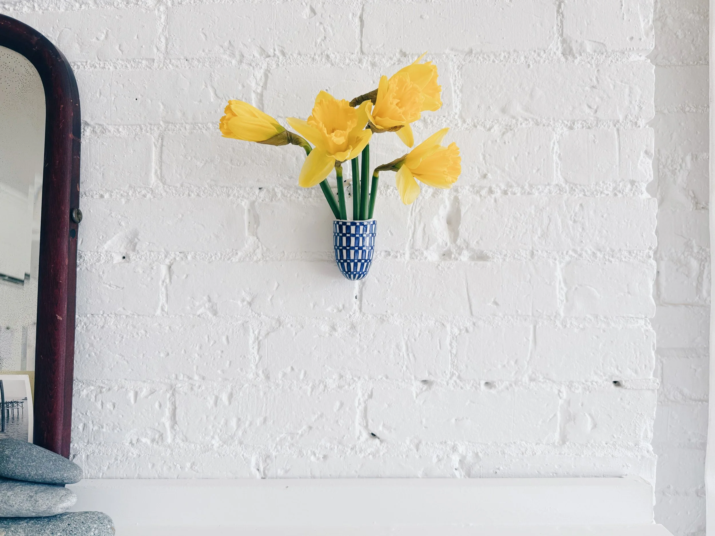 Blue and white, handmade ceramic vessel.