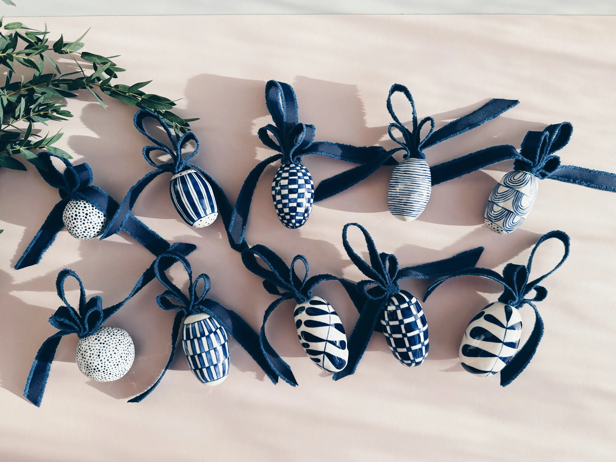 Blue and white, handmade ceramic ornament.